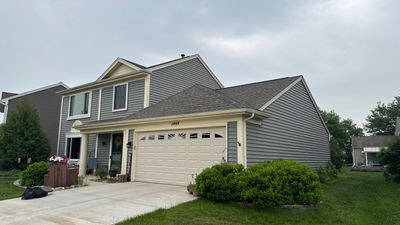 Turtle Shell gutter protection installation in Aurora, IL 60506, photograph 2