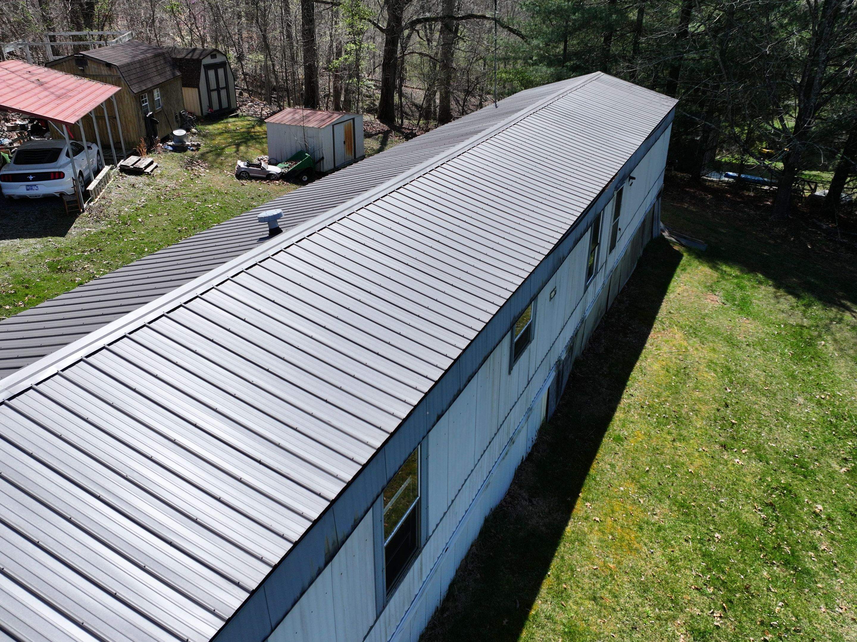 Textured Charcoal Gray using 29 Gauge AG Panel by Omnia Roofing