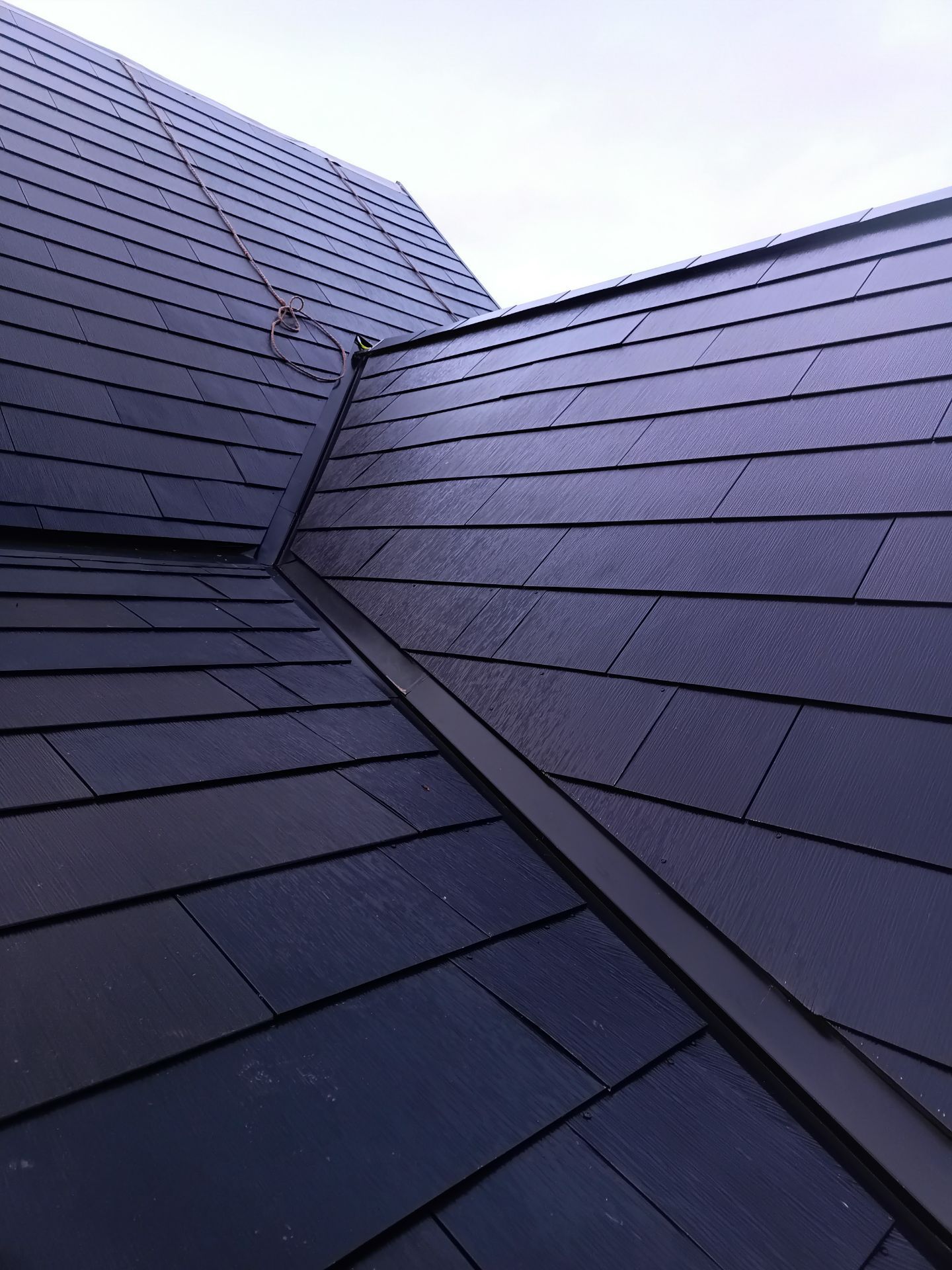 Tesla Solar Roof  using Tesla Powerwall by American Home Contractors
