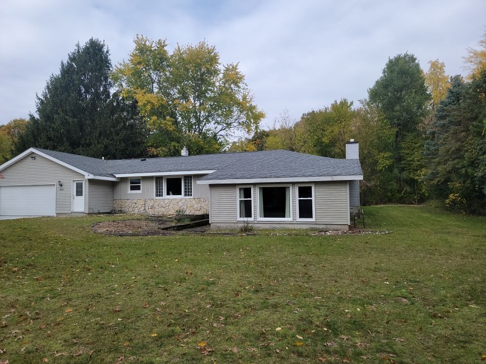 Exterior Remodel by Avalon Roofing and Exteriors