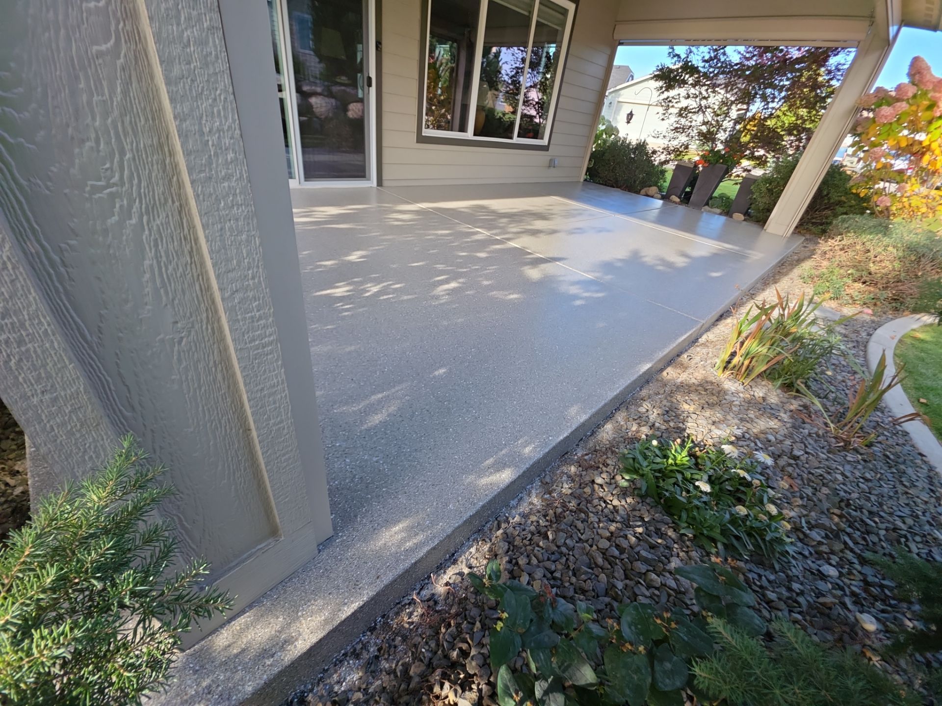 Front Porch and Back Patio Concrete Transformation in Liberty Lake by Croc Coatings, LLC