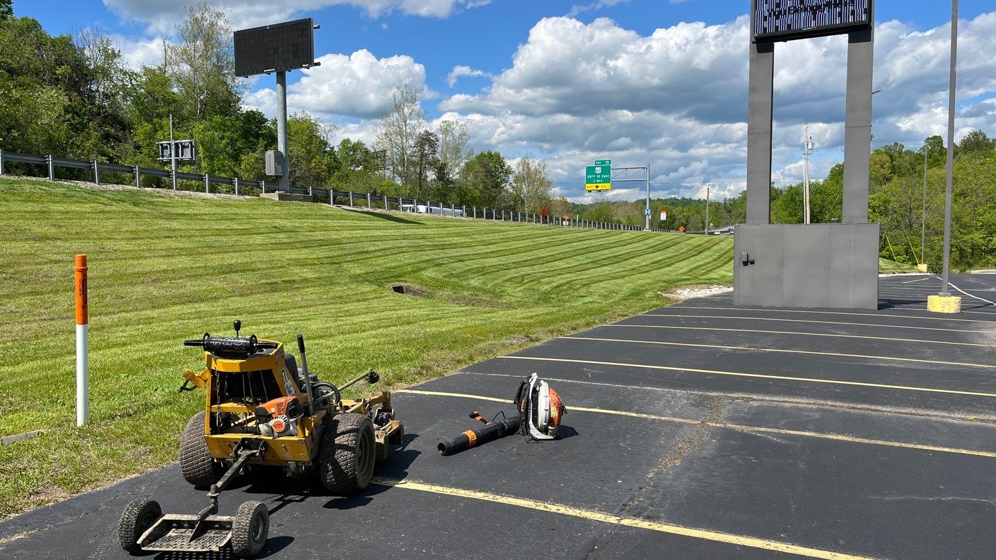 Lawn Mowing using Lawn mower by GrassBusters, Inc.
