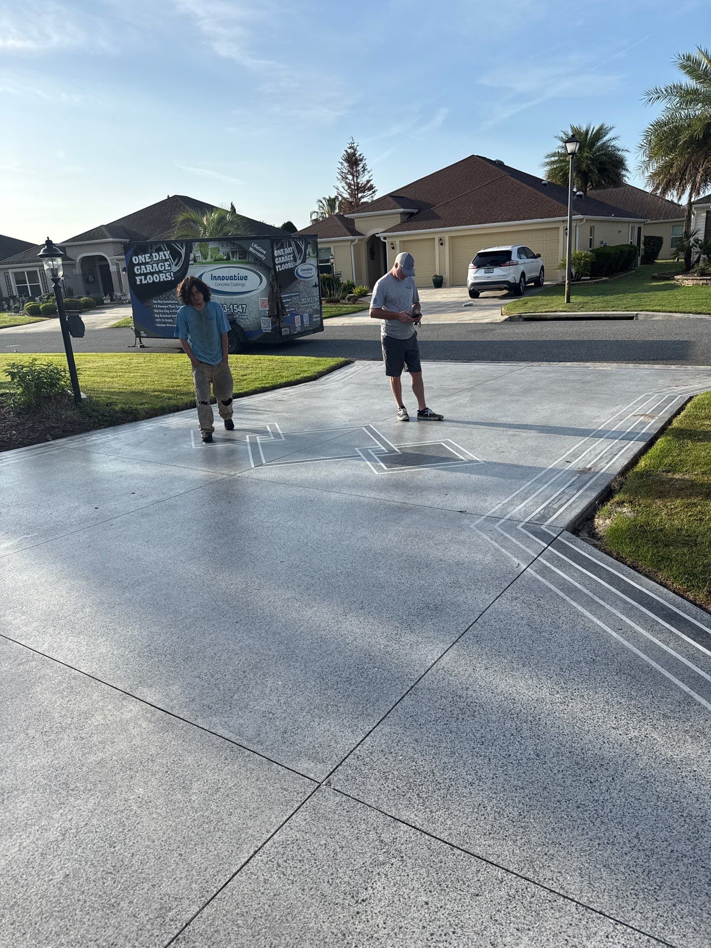 Driveway & Sidewalk Slatestone with Silvercreek borders by Innovative Concrete Coatings 