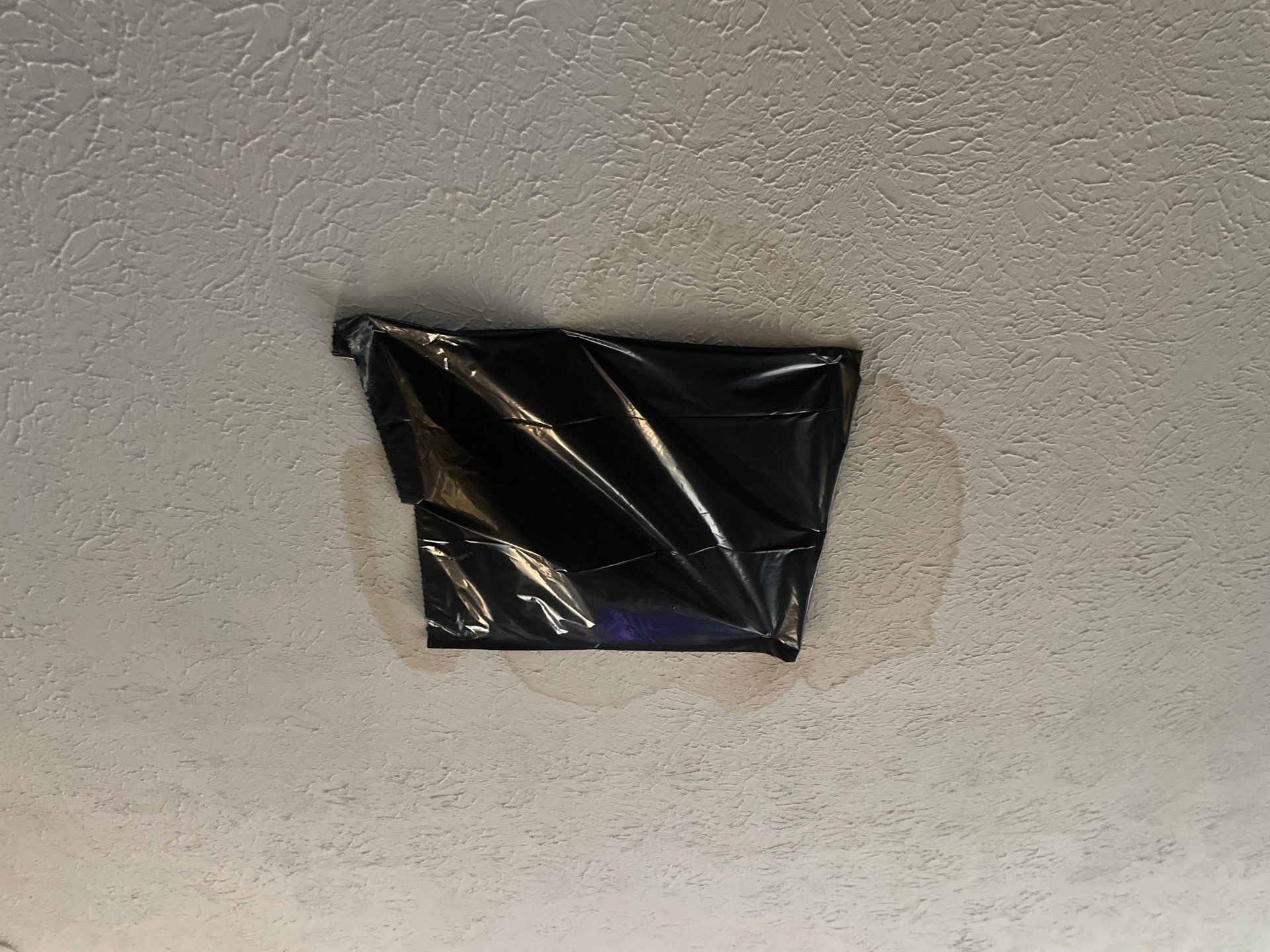 Leak pot water heater by Restoration services