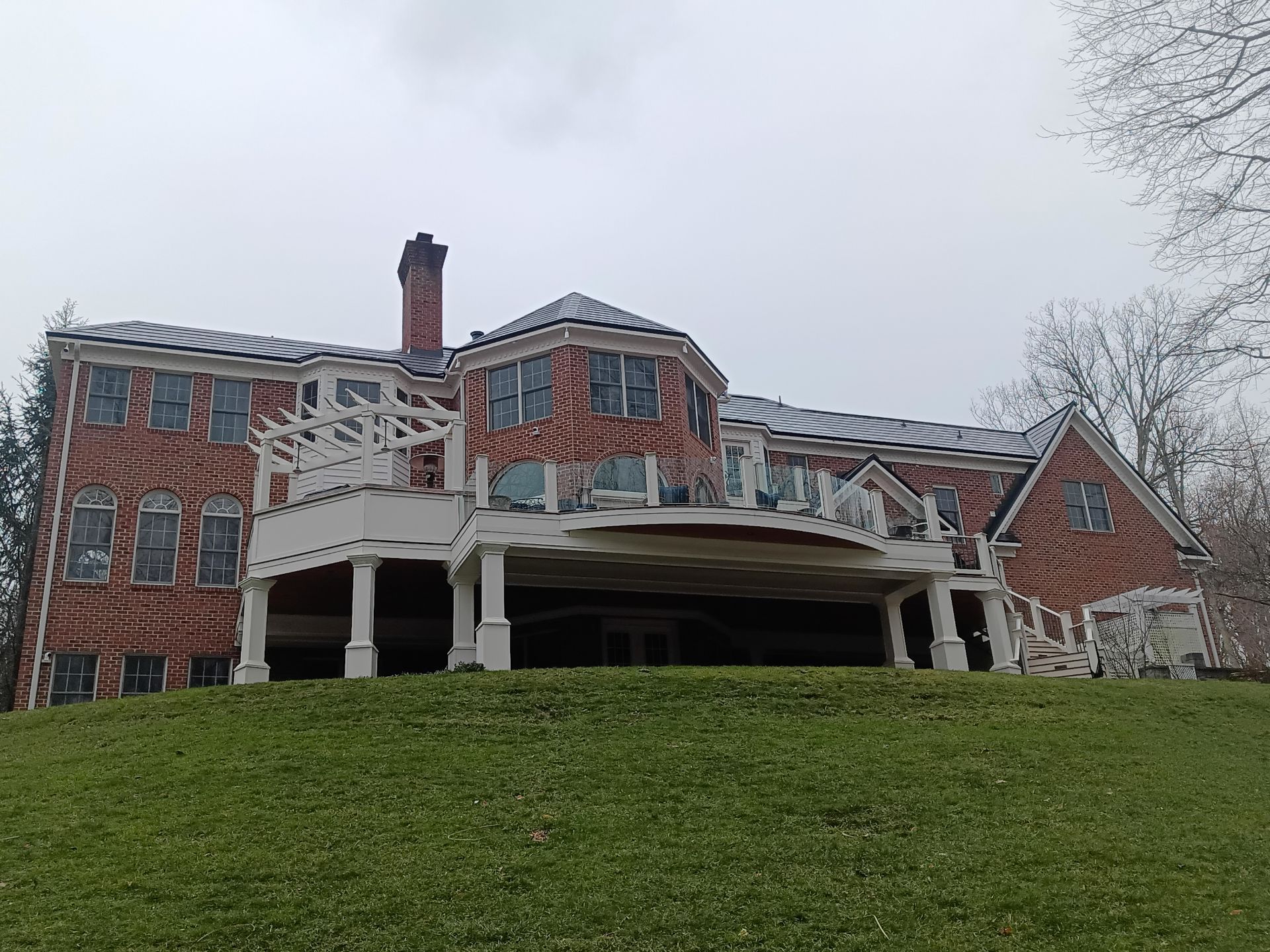 Tesla Solar Roof Replacement  by American Home Contractors