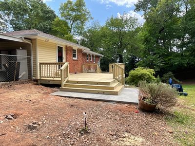 Custom Pressure-Treated Wood Deck and Railing Installation in Decatur