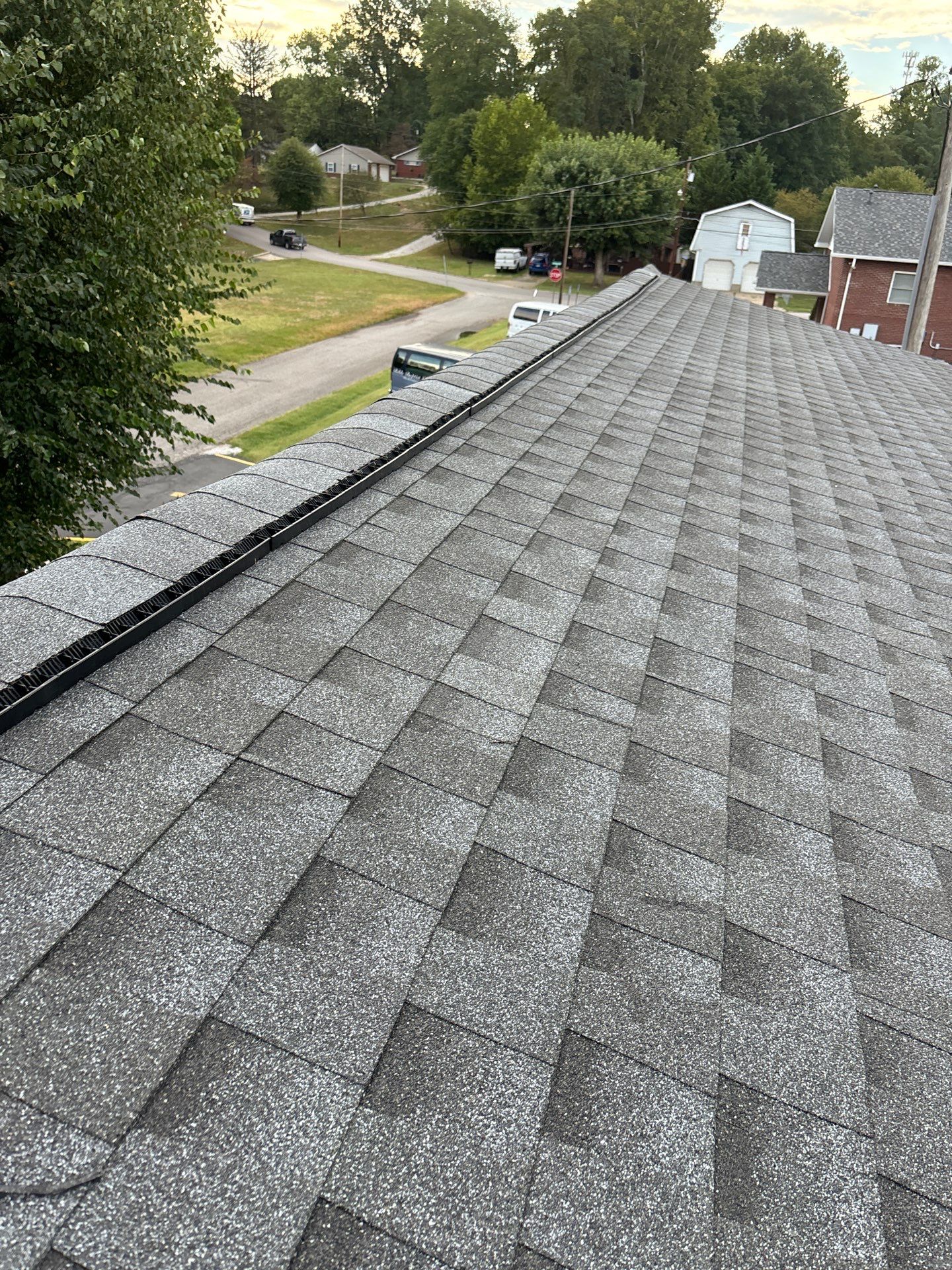 Residential Roofing Installation using Oyster Gray by Rainstoppers Roofing
