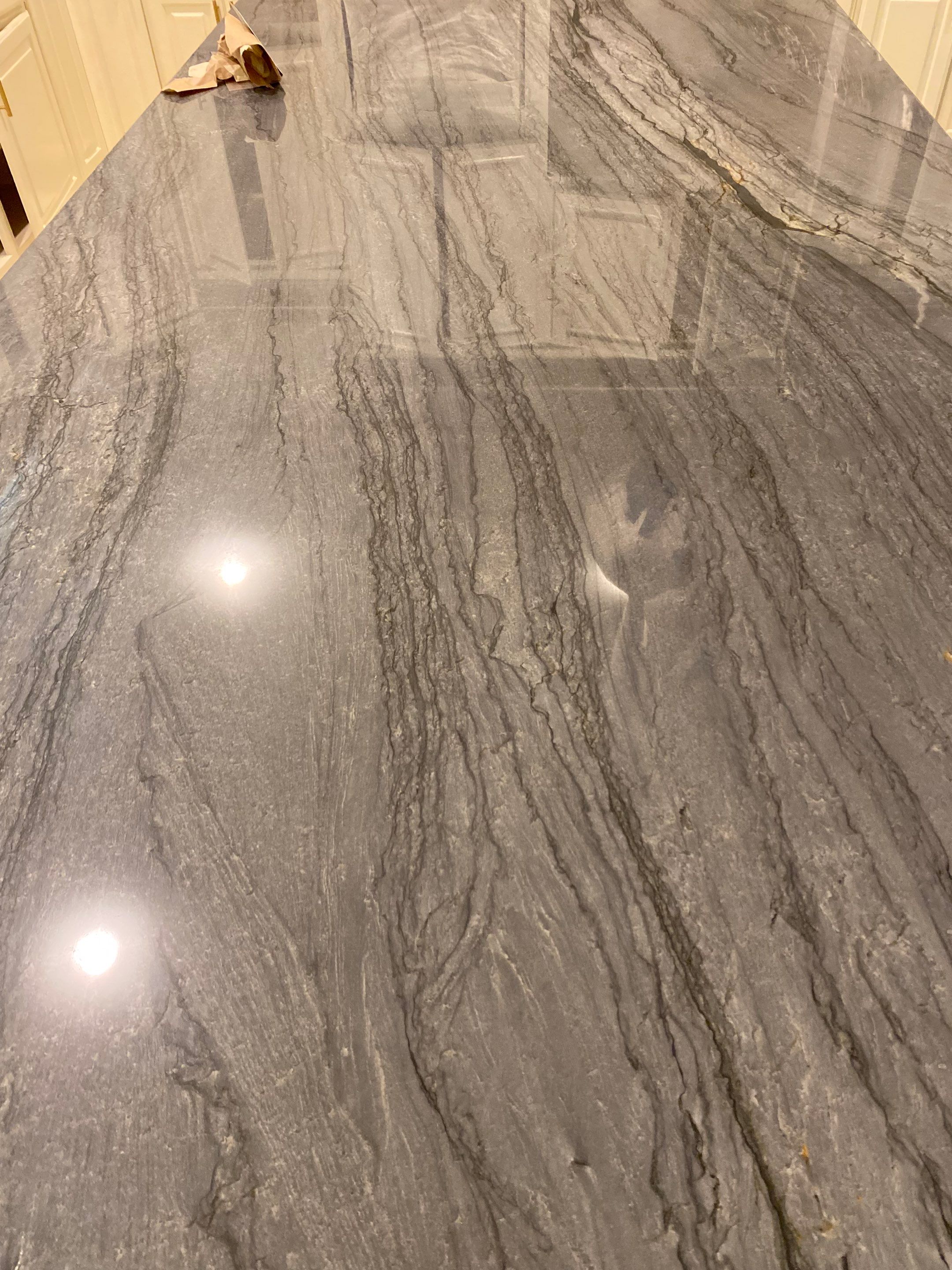 Kitchen Remodel using Quartzite by SLM General Contractors & Roofing