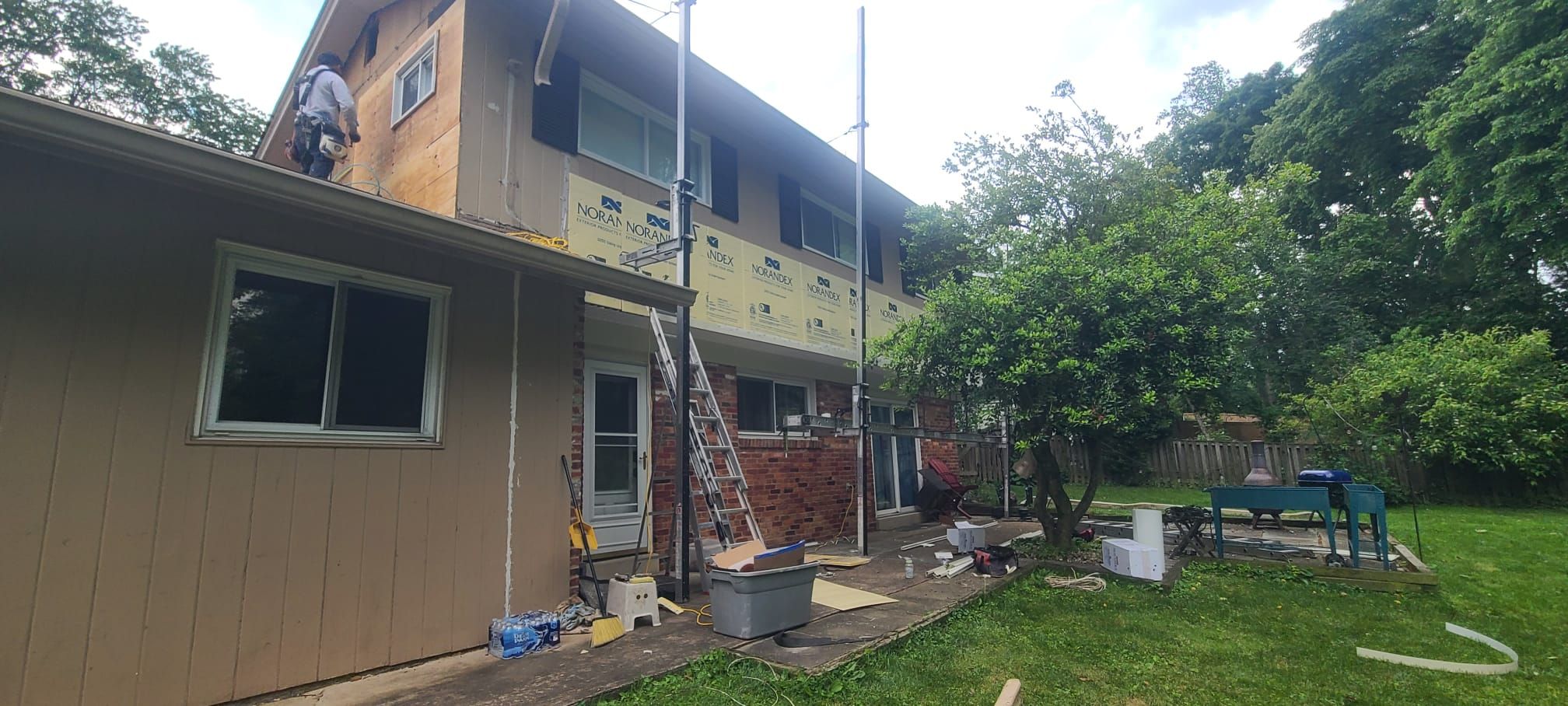 Fairfax: Residential Siding Replacement with CertainTeed 8" Board and Batten Siding in Desert Tan by RM Banning, Inc.
