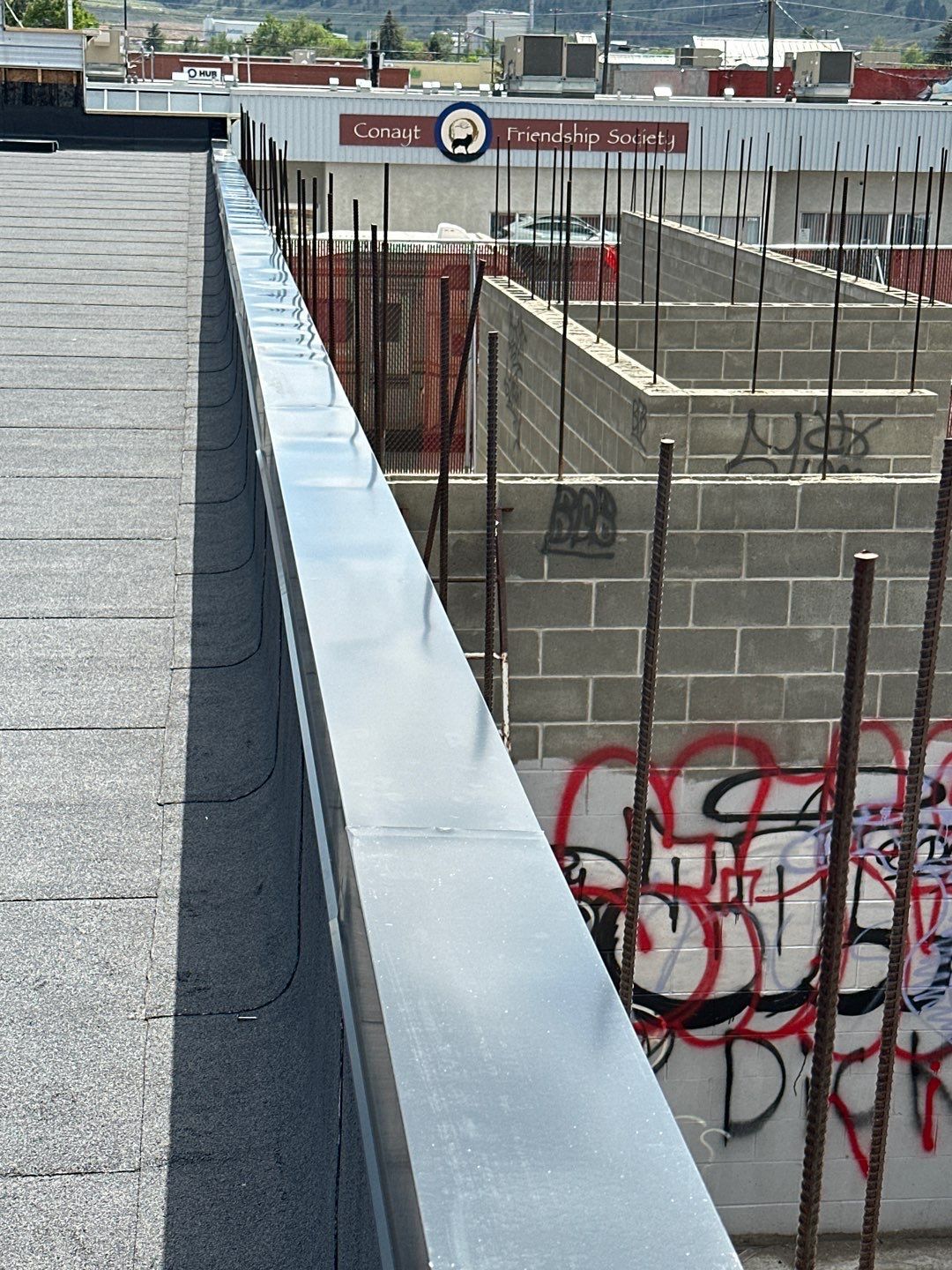 Commercial ReRoofing Installation using IKO 2ply sbs by Top Notch Roofing Inc