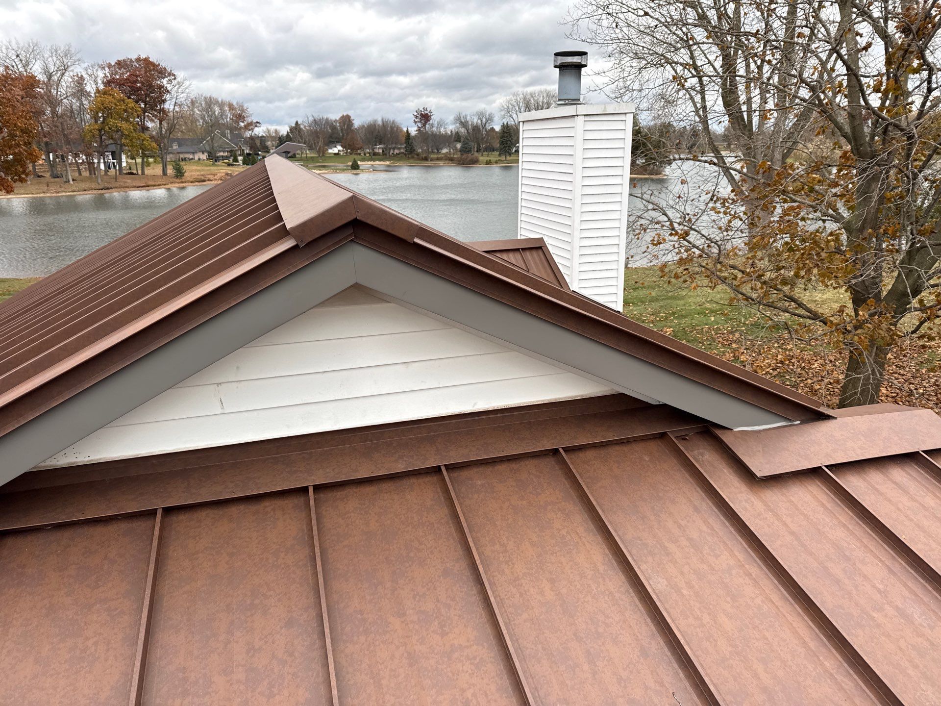 Roof Replacement using MS Standing Seam Roof Western Rust by 180 Contractors