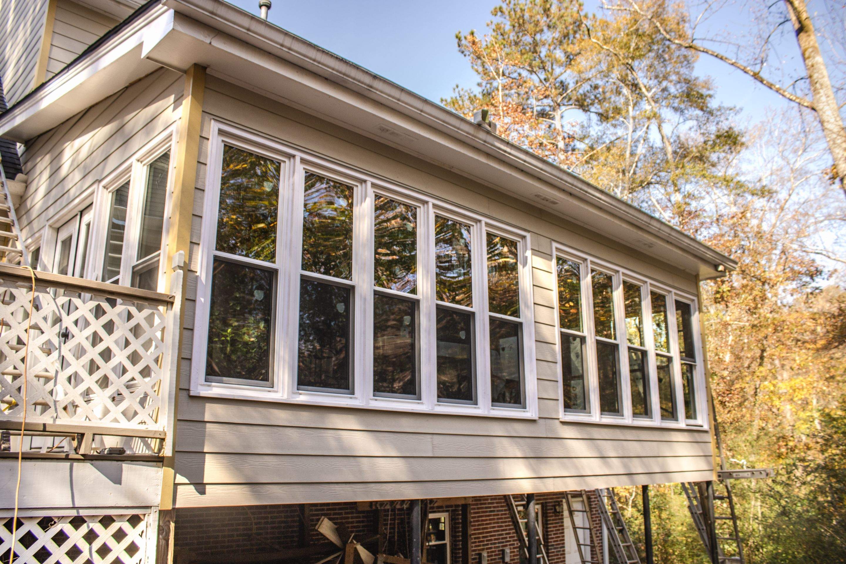 53 Window Replacements with Master 2800 Series Vinyl Replacement Windows and James Hardie Siding Installation by Nelson Exteriors 