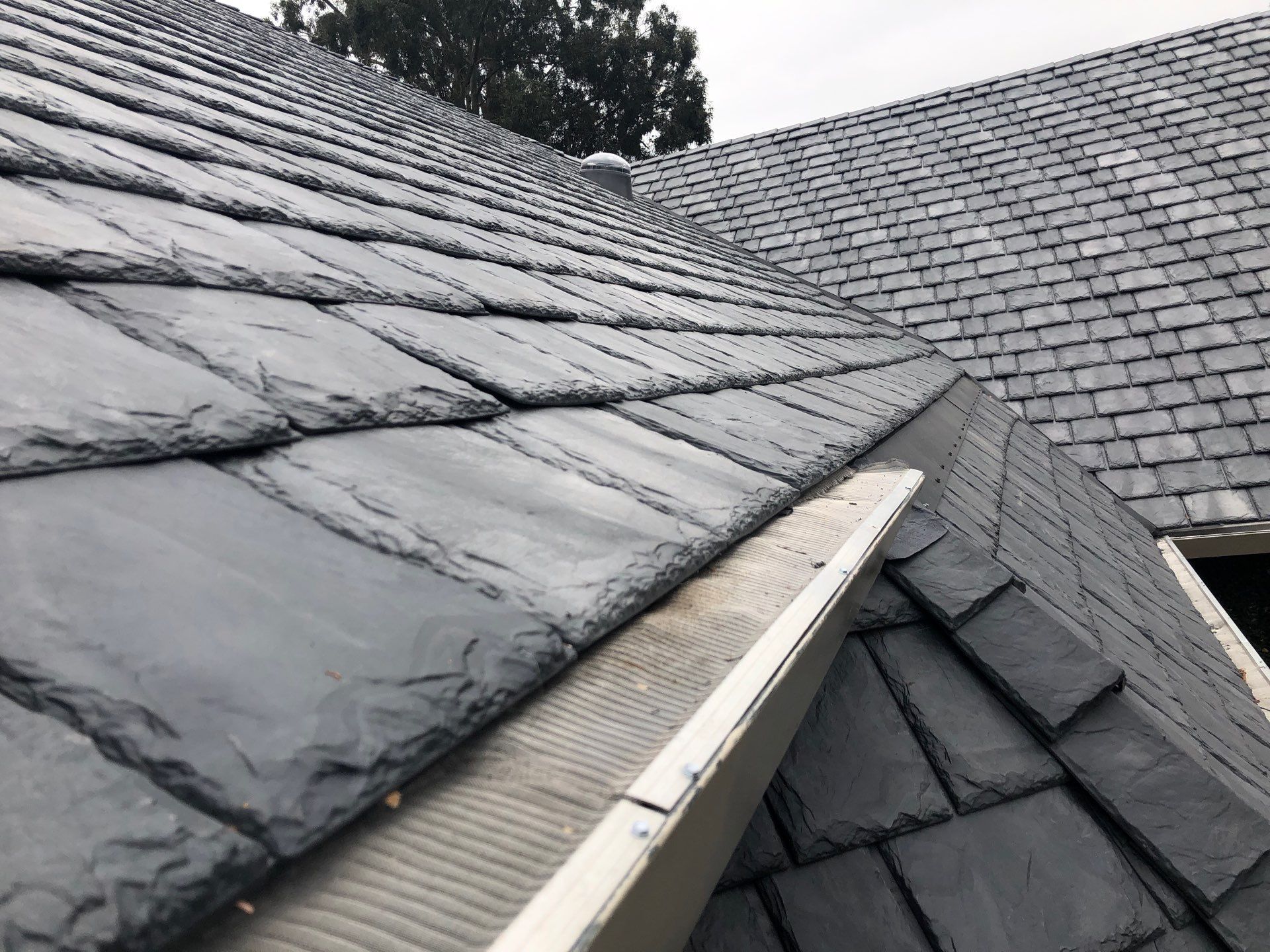 Residential Roofing Installation using Slate by Acker Roofing