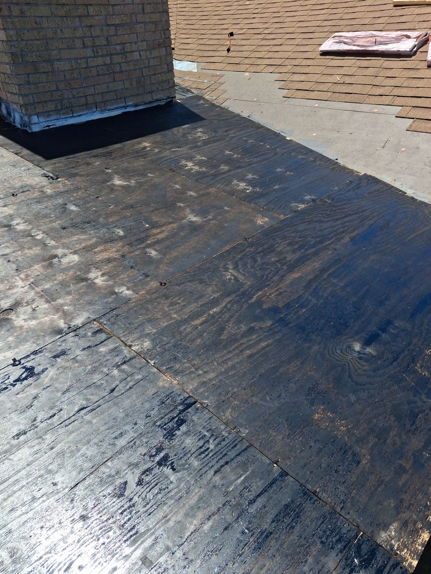 Chimneys need a Cricket.  by Bayfront Roofing and Construction