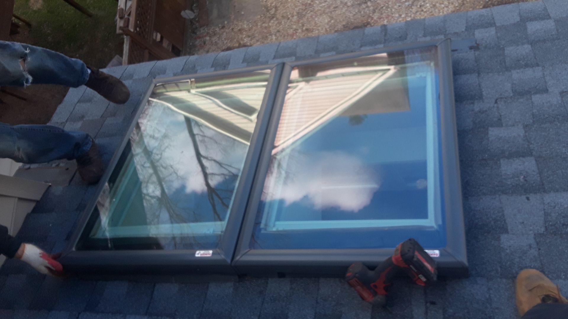 Roof, Window, and Skylight Replacement by American Home Contractors