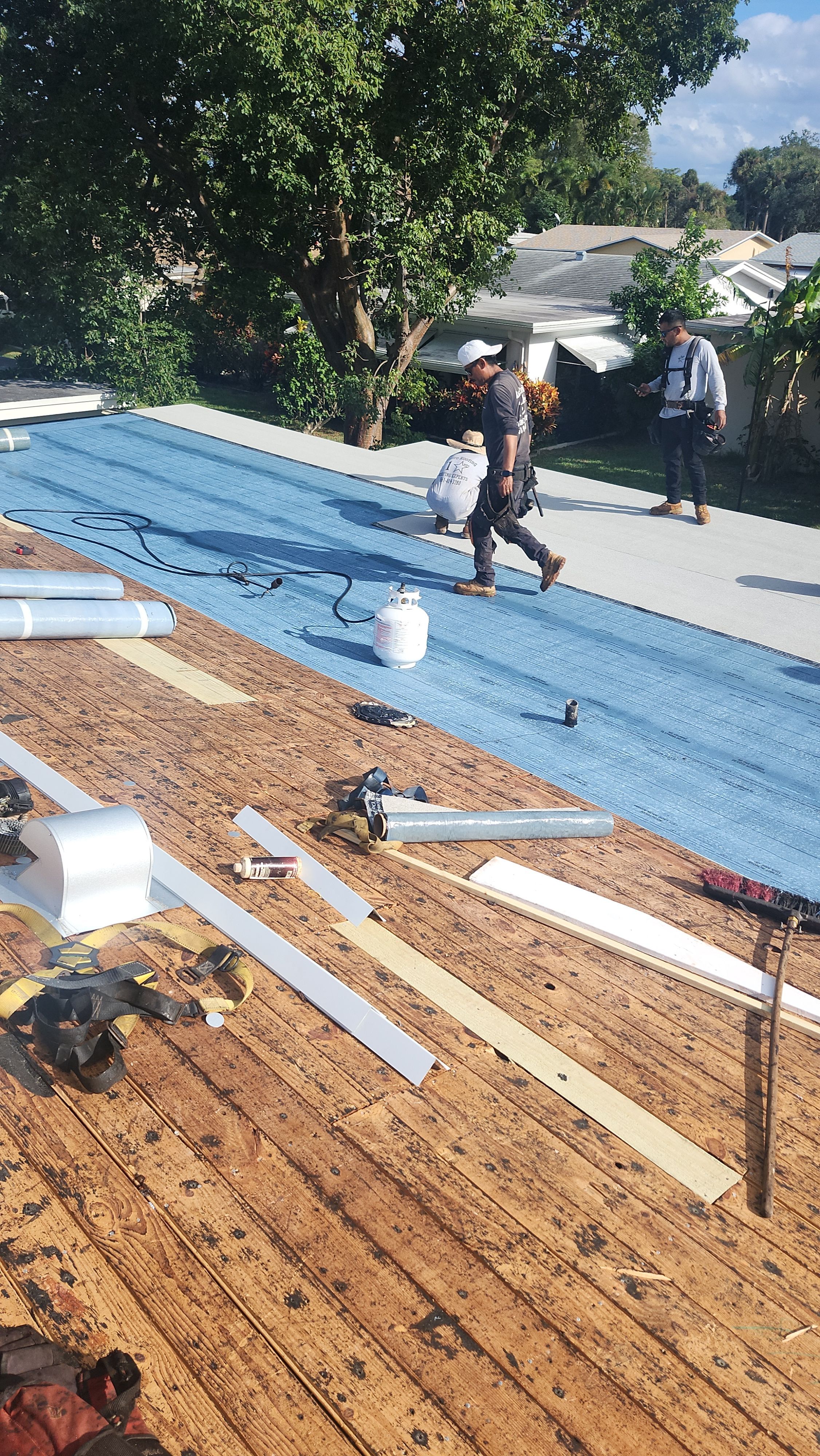 Silicone install-- Flat roof by Aastro Roofing