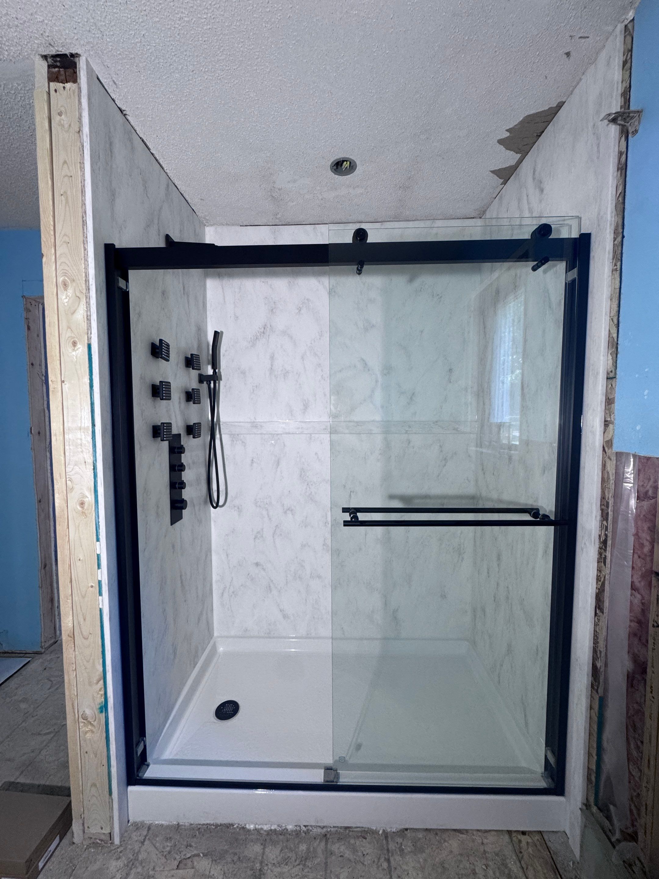 Total Upgrade: Class 4 Roof Replacement + Luxury PuroStone Showers by Forever Fortified
