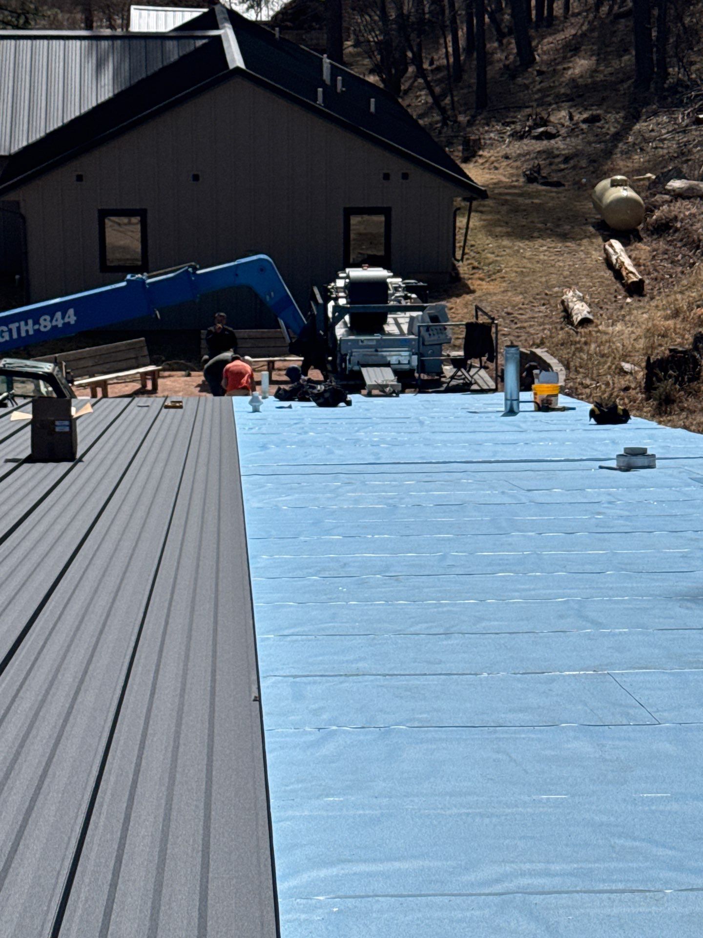 Residential Roofing Installation using Steel Roofing by Weather-Tite Exteriors LLC