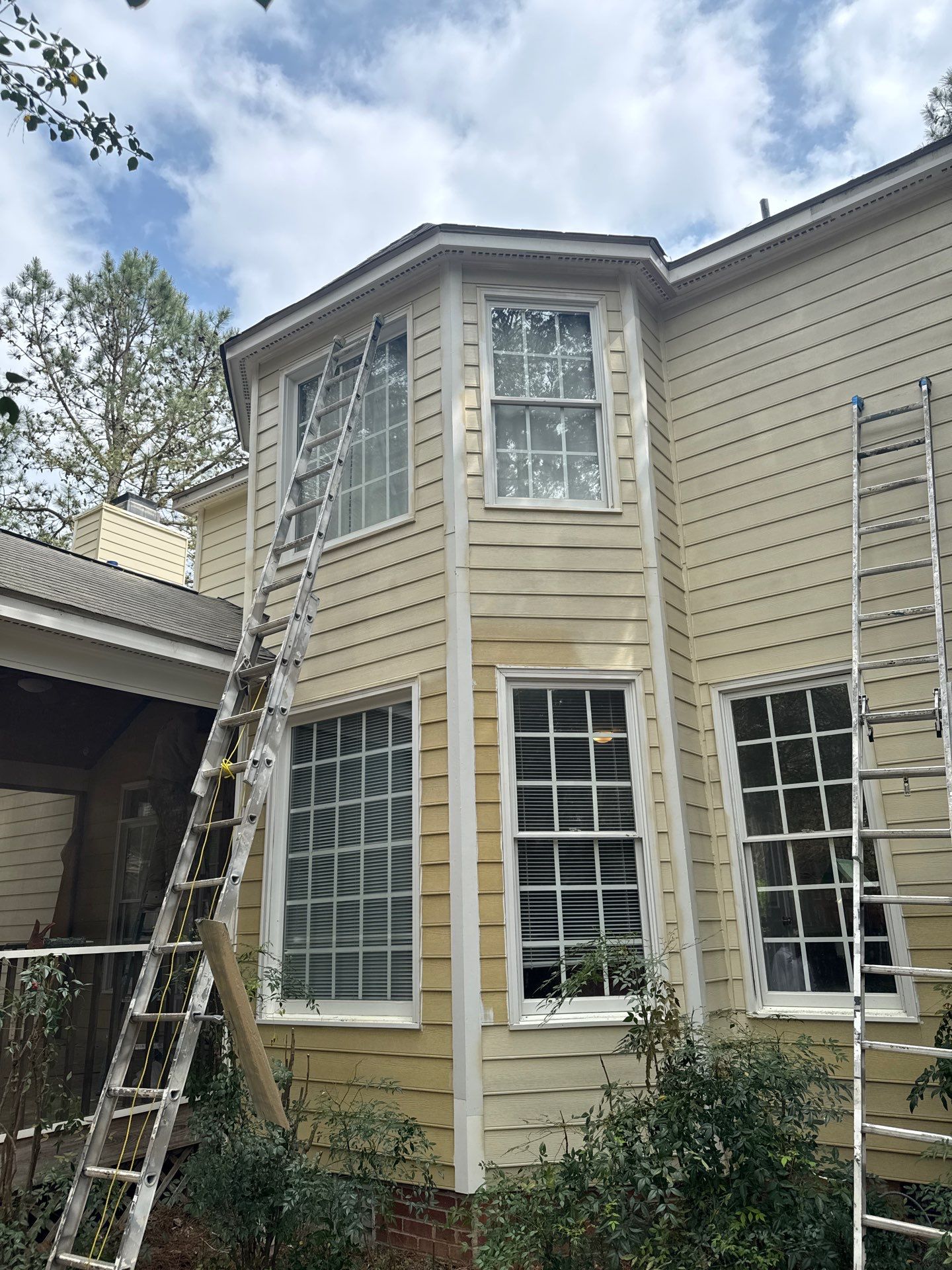 Exterior paint and siding replacement by GonzalezPainters & Contractors Inc 