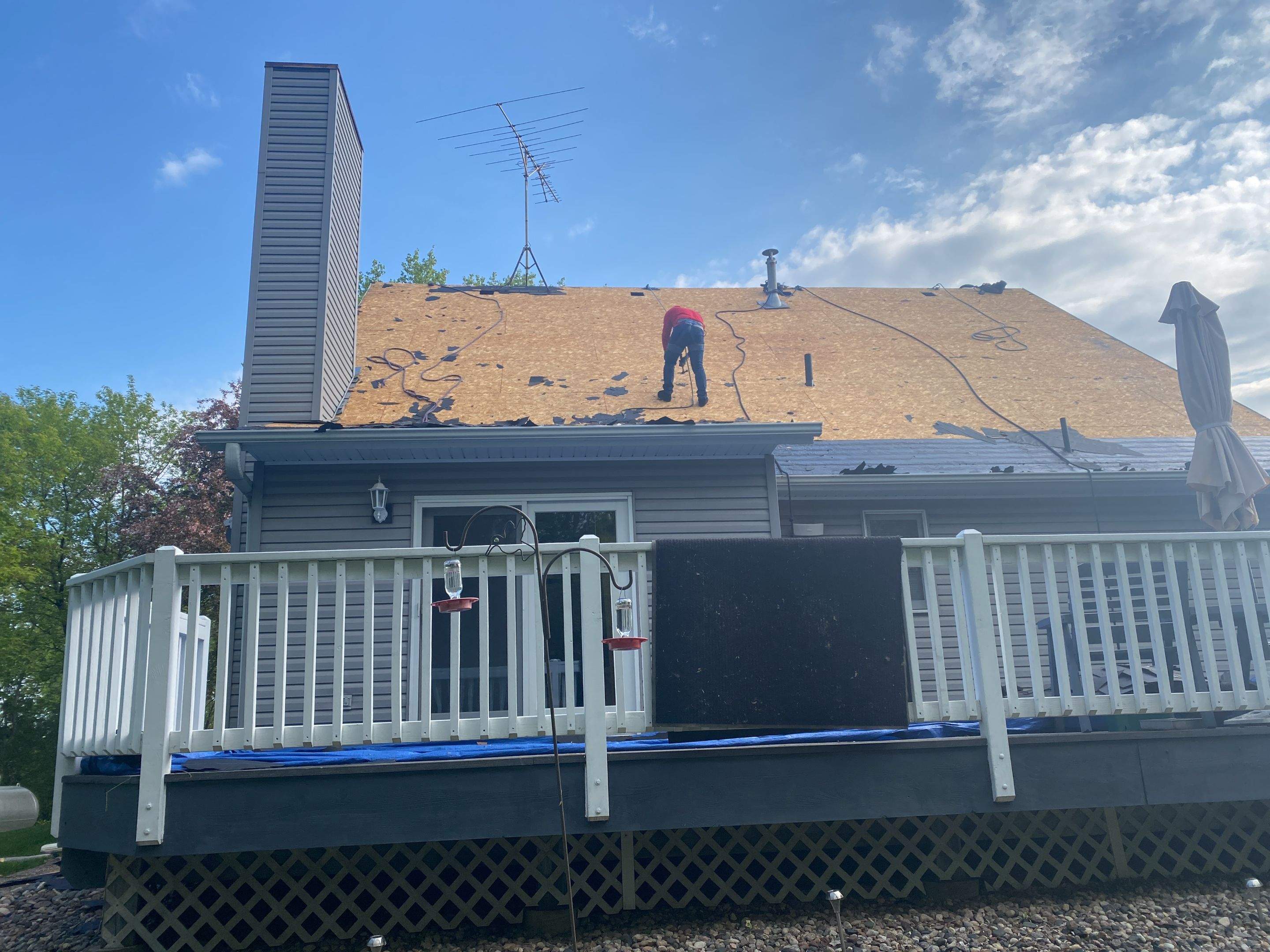 Residential Roofing Installation using Certainteed Landmark Moire Black by MODERN EXTERIOR SYSTEMS