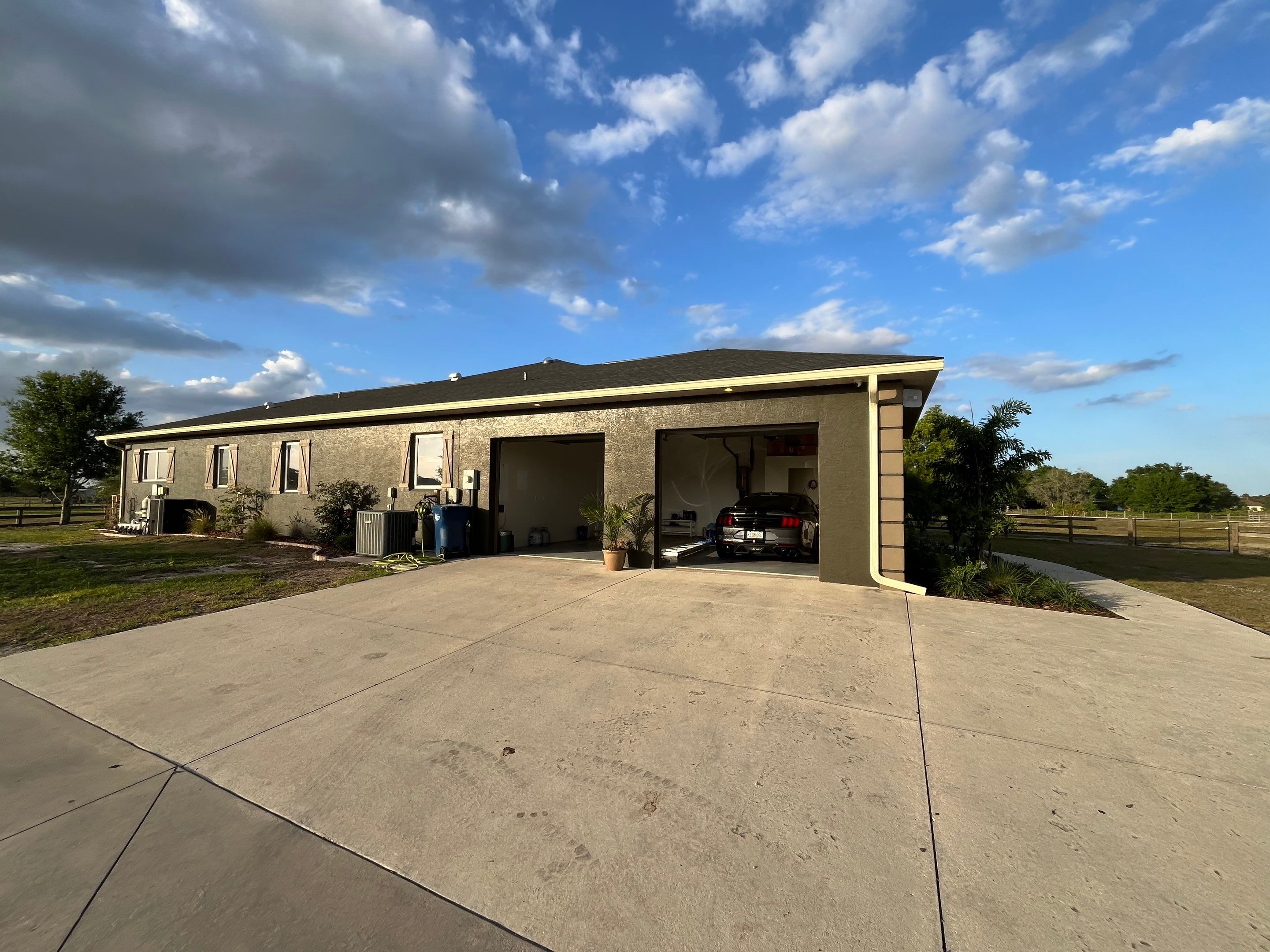  7-inch White seamless gutters and downspouts in Myakka City FL by Gutter Professors
