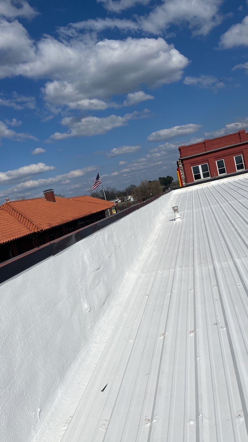 Commercial Metal Restoration System using Aldocoat Coatings by Hostetler Roofing