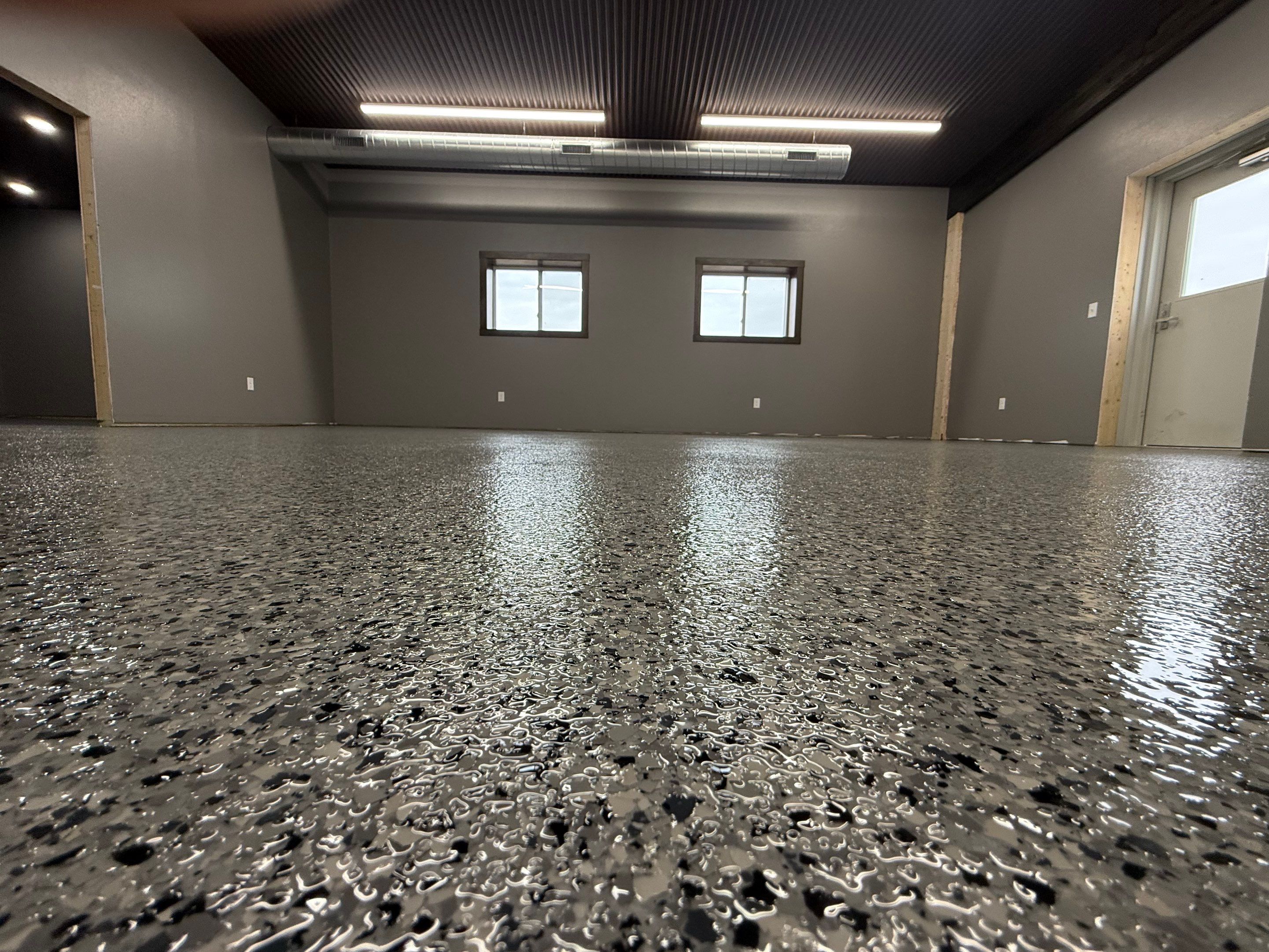 Nightfall Flake Floor Coating Installation in Draper by Select Painting, Coatings & Garage Cabinets