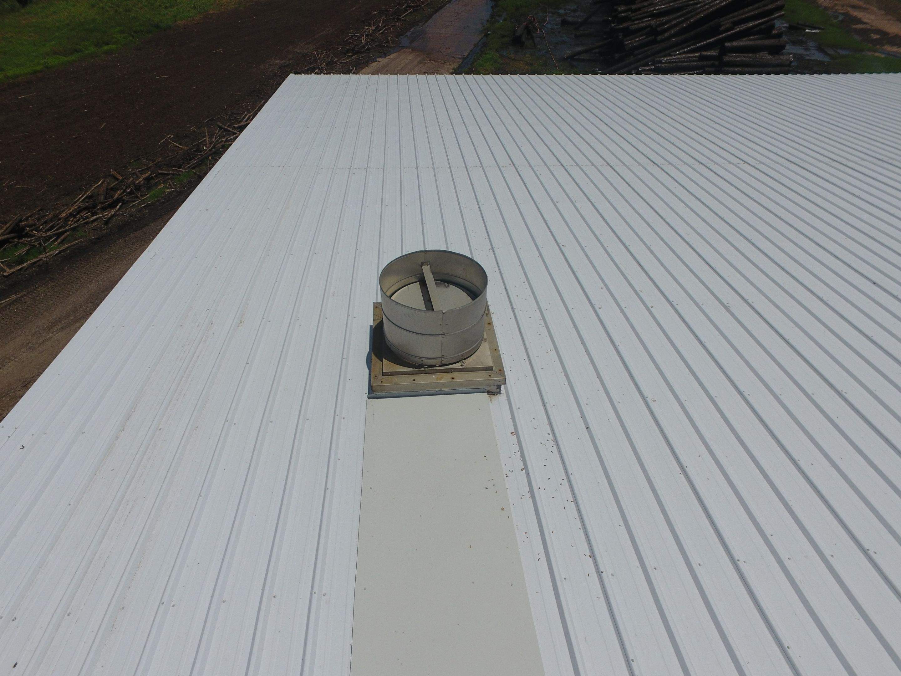 Commercial Roofing Installation using Aluminum Roofing panels by Hostetler Roofing