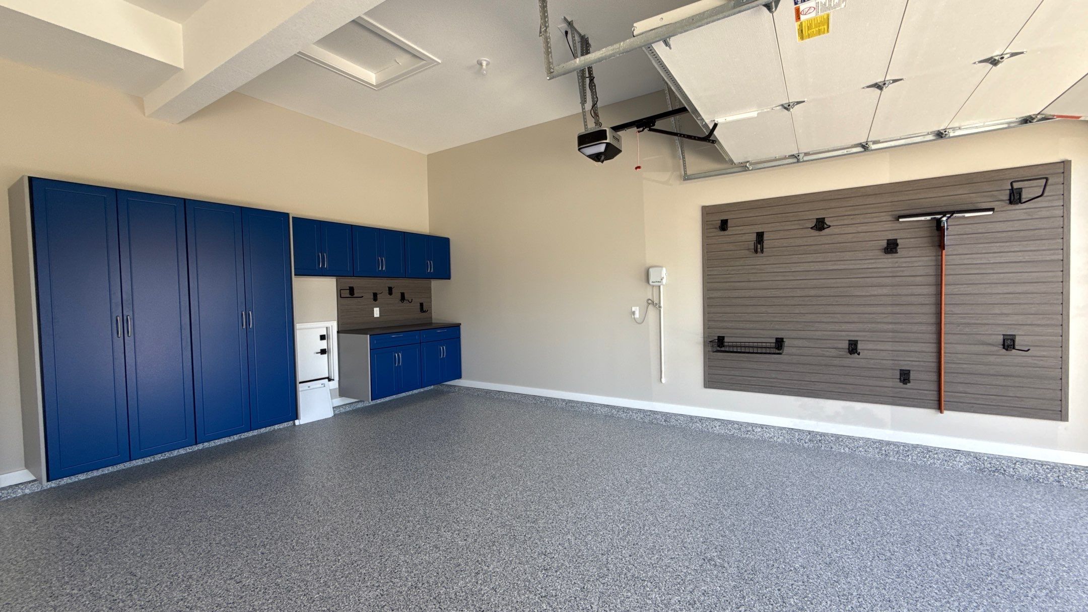 Rachael New Floor and Storage Makes All the Difference by Banner Garage