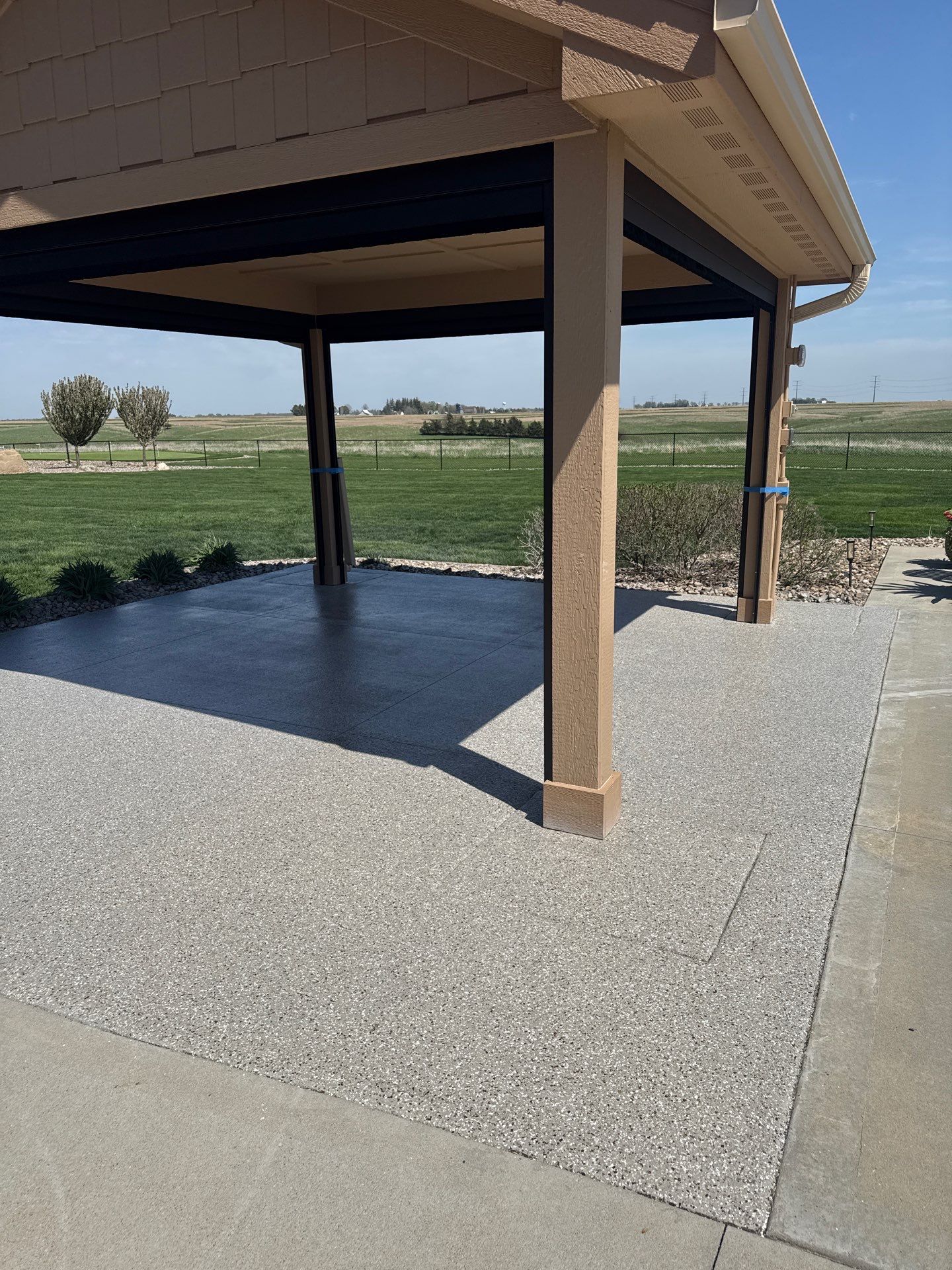 Winterset, IA Patio and Garage Bundle by Revival Concrete Coatings