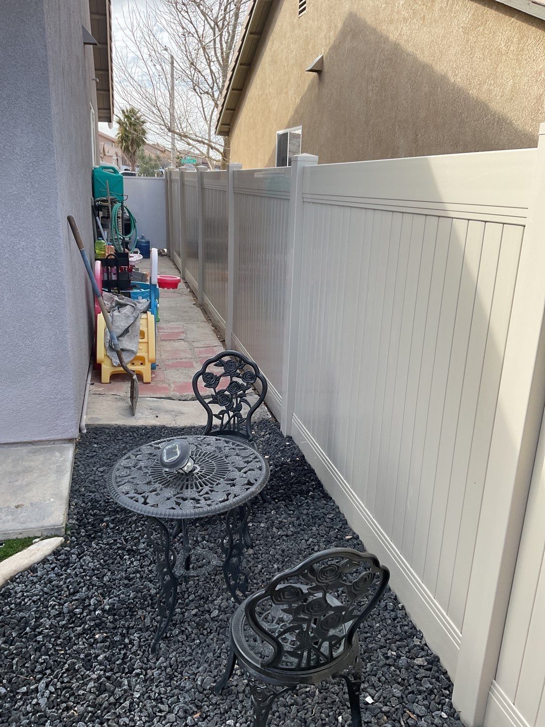 Tan Privacy Vinyl Installation by Fence Guys Inc. 