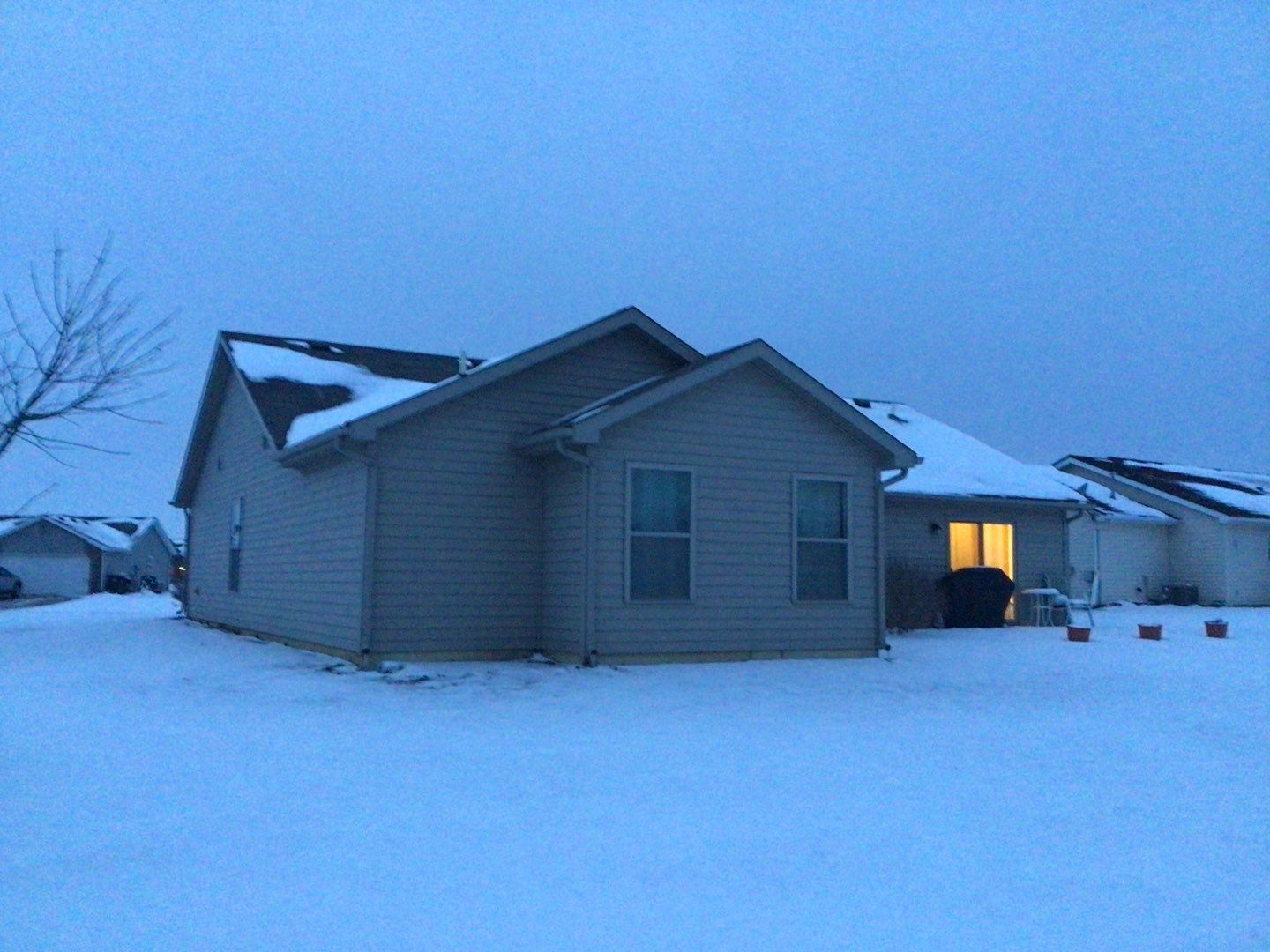 Burgundy Exposed Fastener Metal Roof in Columbia City, Indiana Country Home by 4Ever Metal Roofing