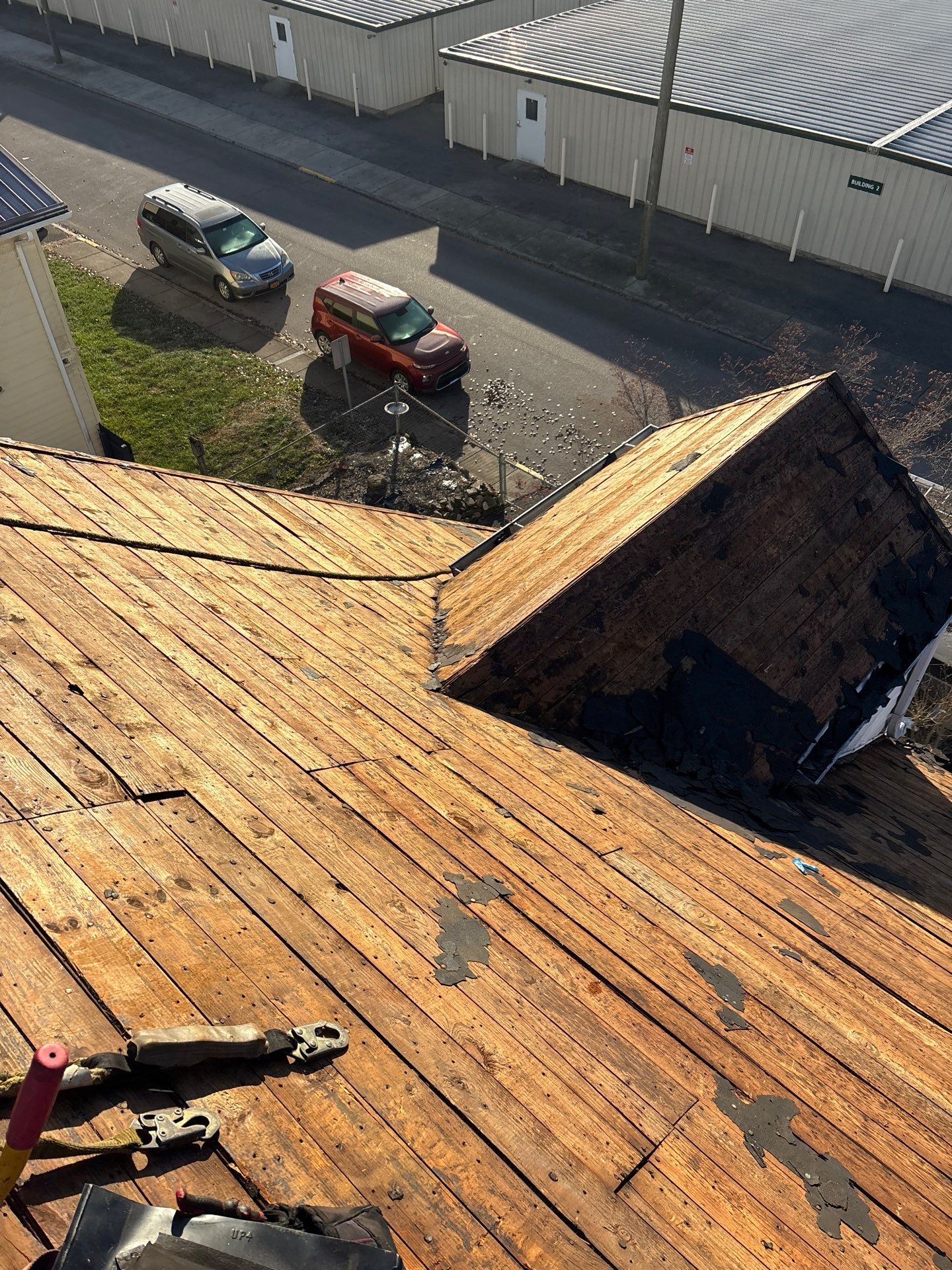 Residential Roofing Installation using GAF Timberline HDZ Charcoal by Rainstoppers Roofing