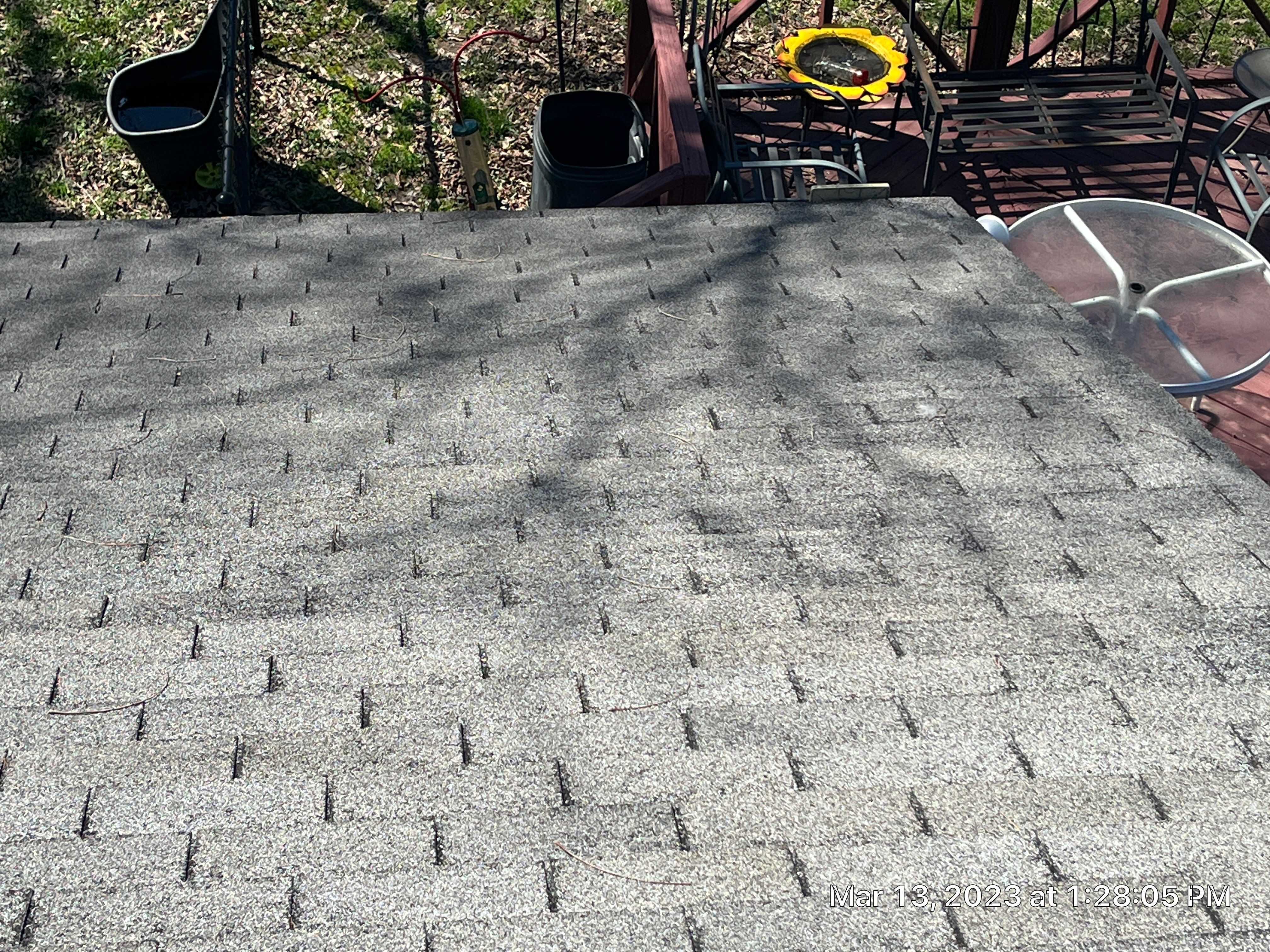 Residential Roofing Installation using 26 Gauge Colored Panels by Hostetler Roofing
