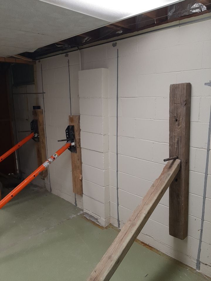 Wall Straightening and Reinforcement using Embedded Fiber Reinforcement by Toledo Basement Repair 