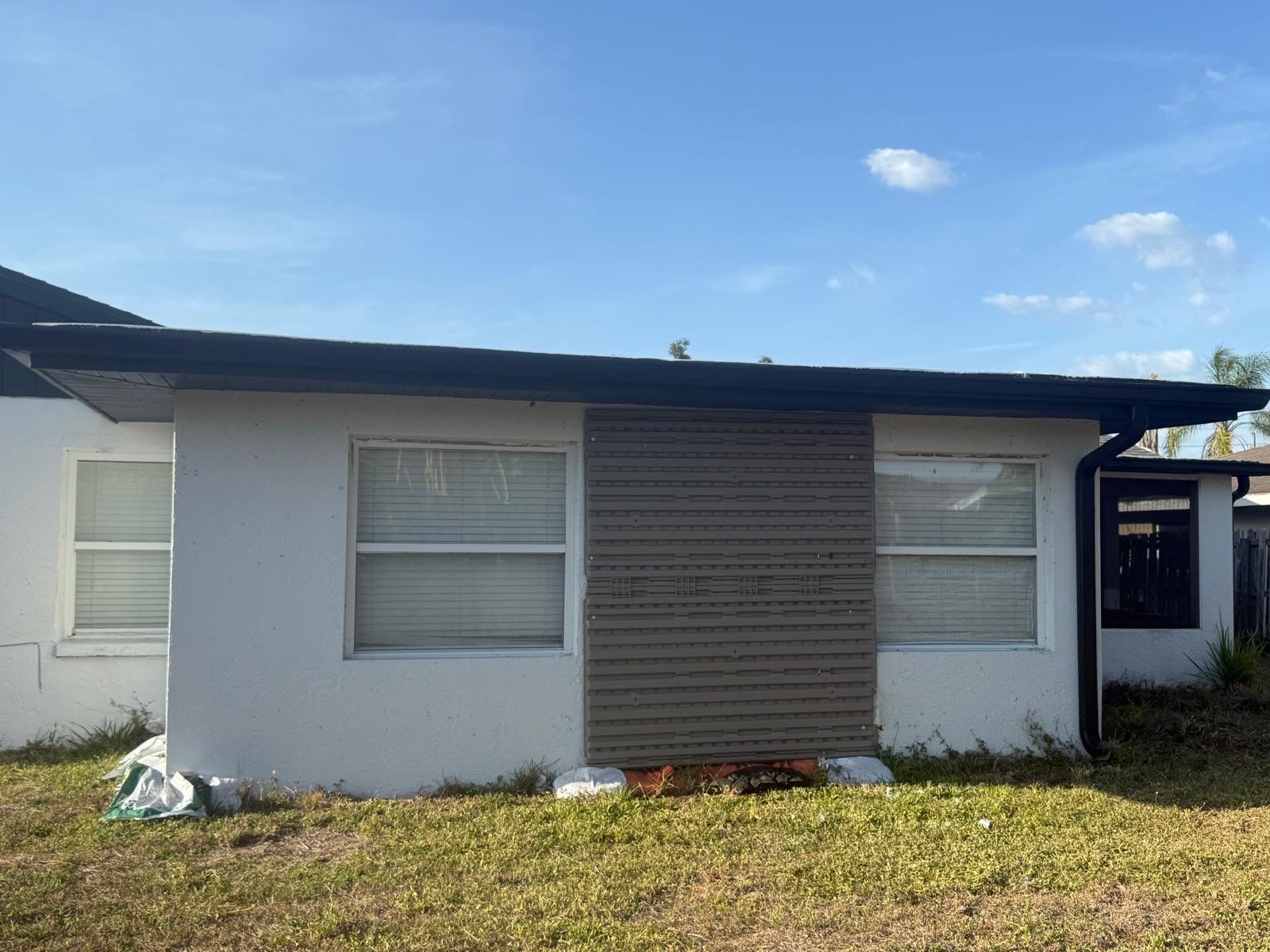 New Downspouts and Splash Guards in Sarasota FL by Gutter Professors