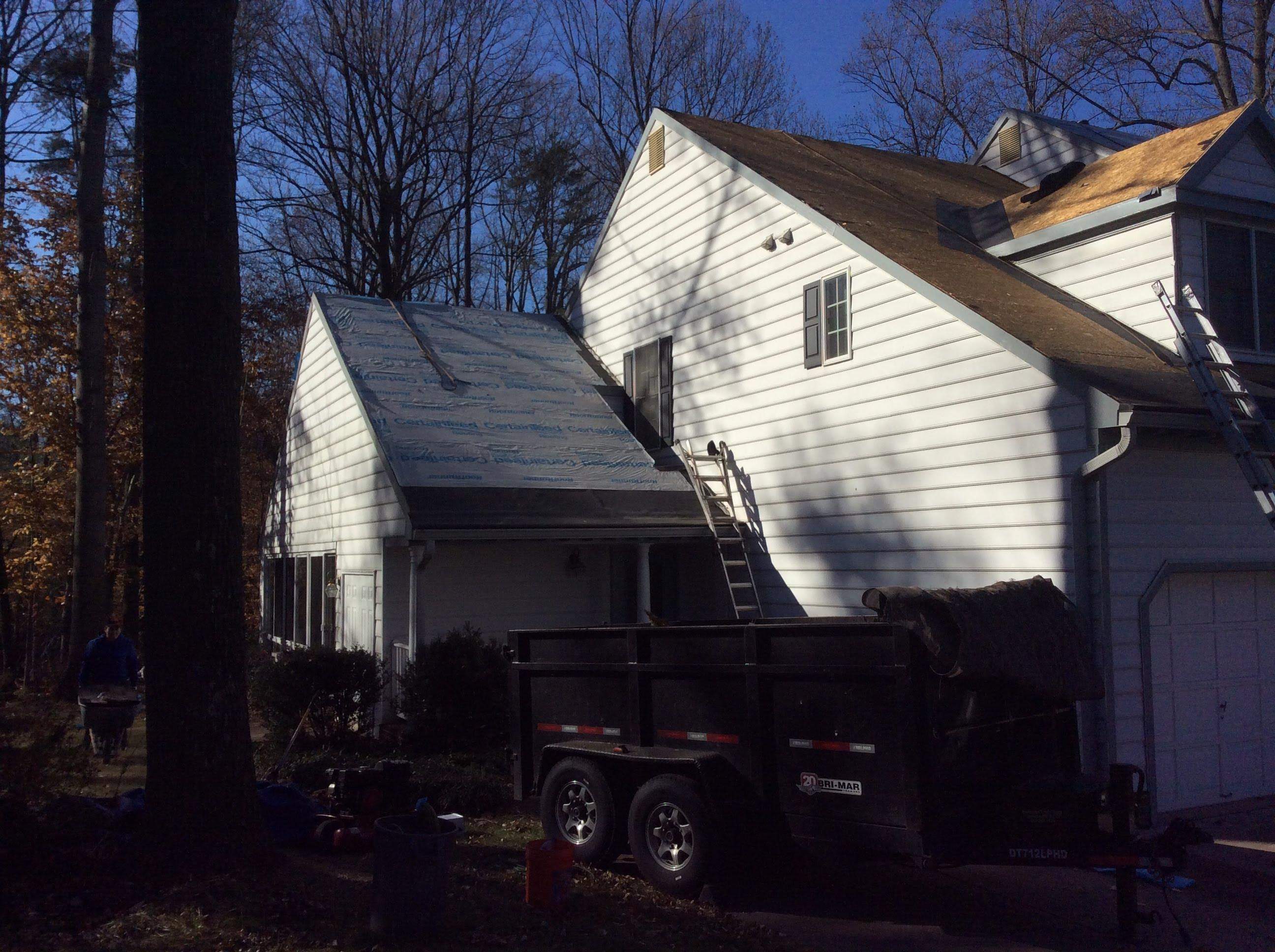Residential Roofing Installation using Charcoal Black by Alpha Design Services