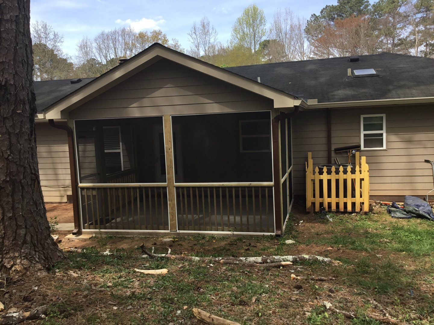 Screened Porch Construction with Vaulted Wood Ceiling in Douglasville by Swift Home Renovations