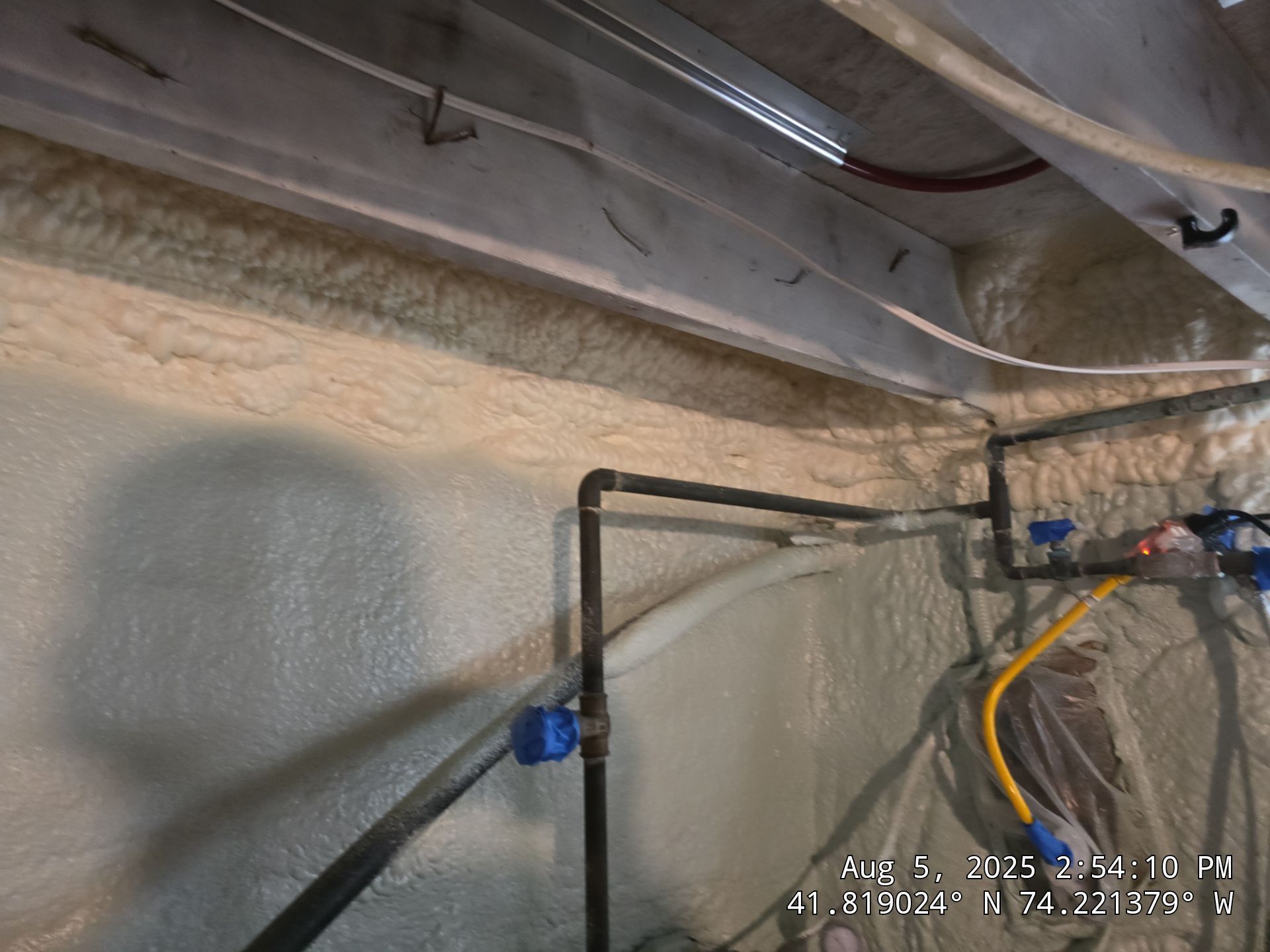 Master bedroom Exterior Walls using open cell spray foam by NYS Foam & Energy