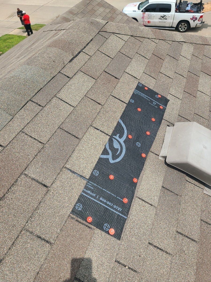 Hail Damage using Owen's Corning Duration (Lifetime) Shingles by Roof Repair Company