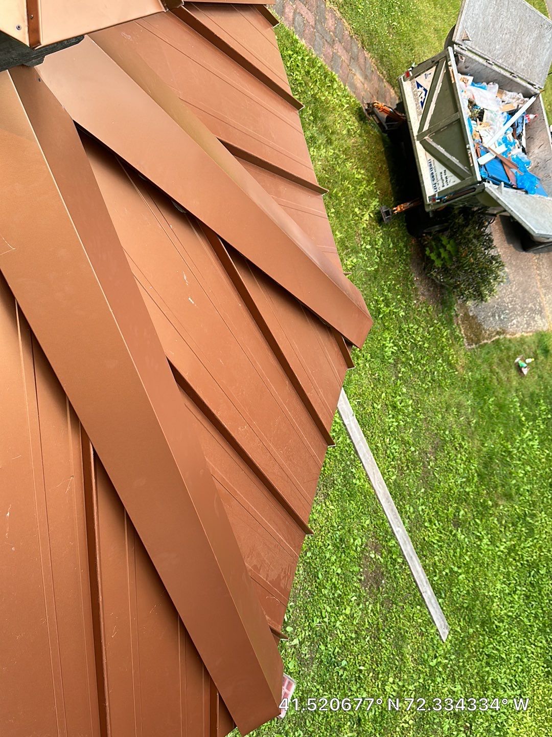Residential Roofing Installation using Copper Penny Metal Roof by A Plus Exterior