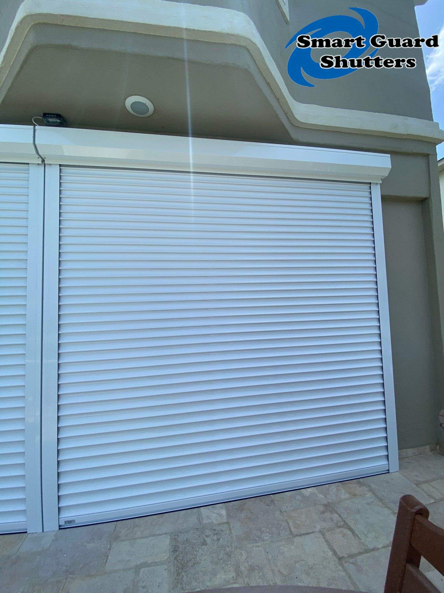 Rolling Shutters in White  by Smart Guard Shutters