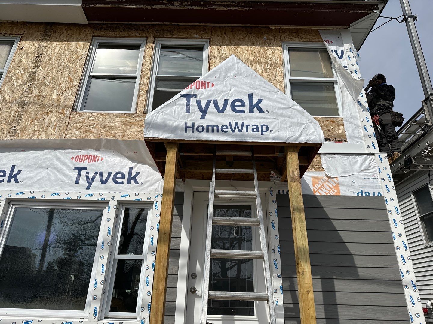 Siding Installation using Hardie Plank Aged Pewter by A Plus Exterior