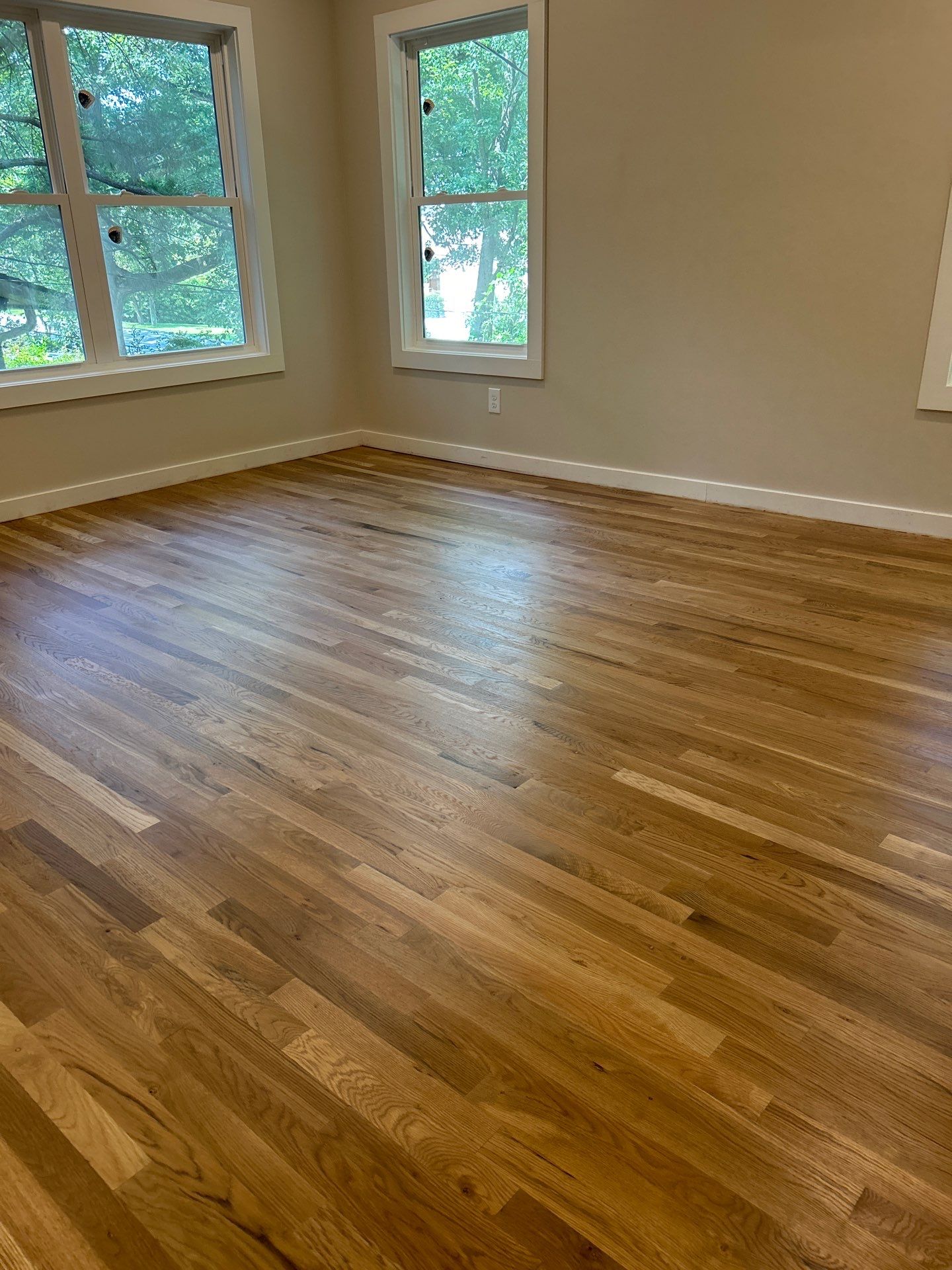Remodel with existing and new white oak by Footprints Floors of East Atlanta