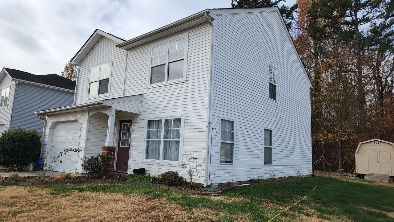 House Wash using cleaner by Power Wash Masters LLC