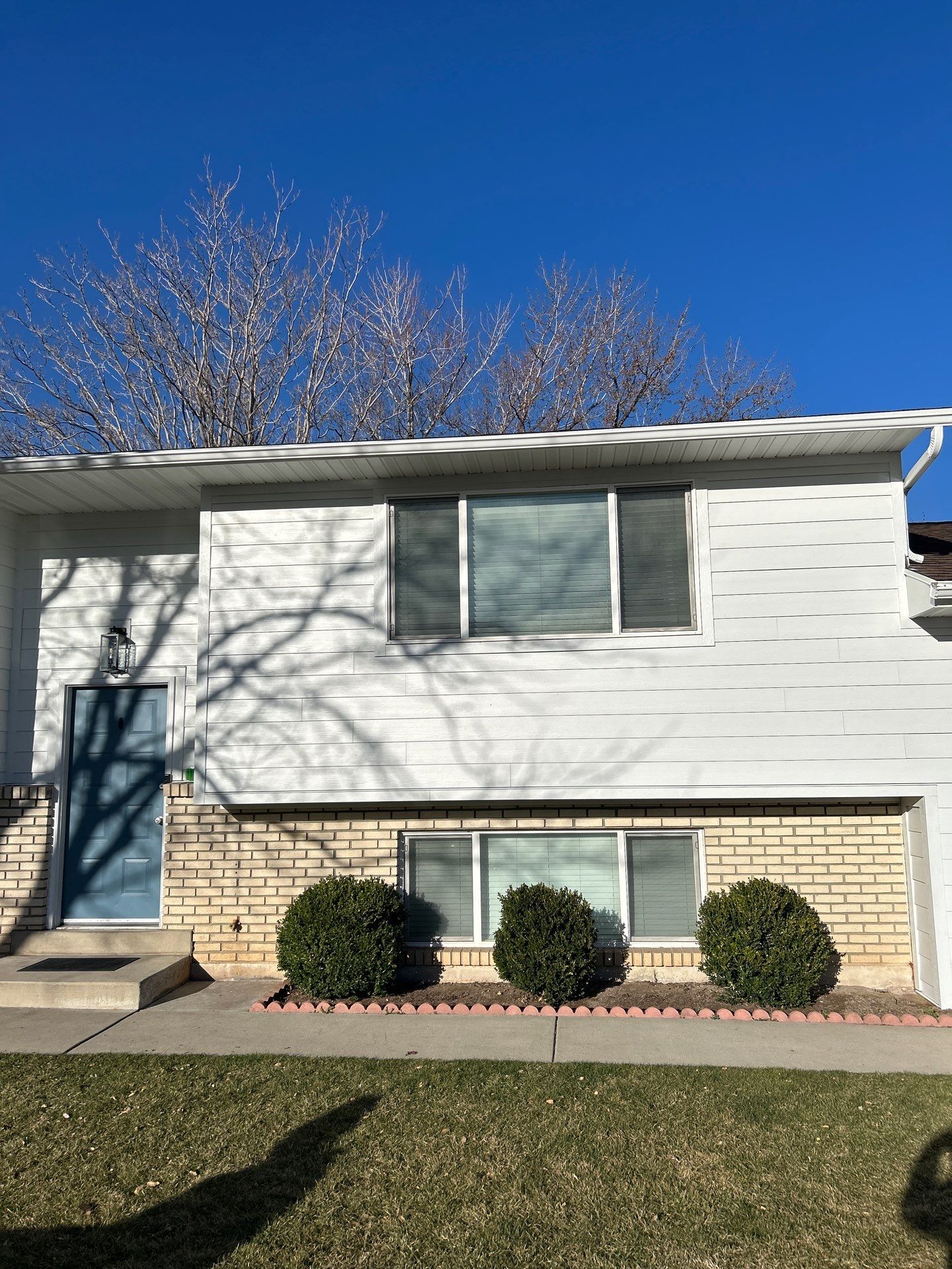 Orem | Crisp Monochromatic Hardie Upgrade | Arctic White by Ideal Siding Utah