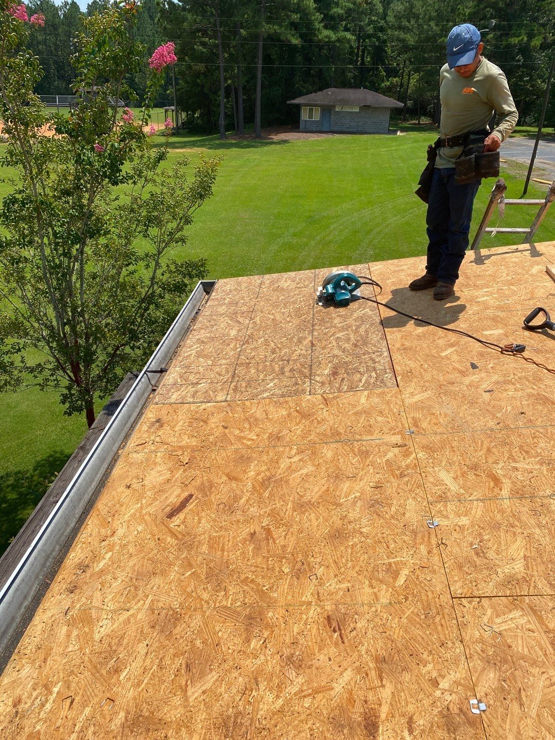 Commercial Roofing Installation using Roof Replacement by American Roofing & Construction LLC