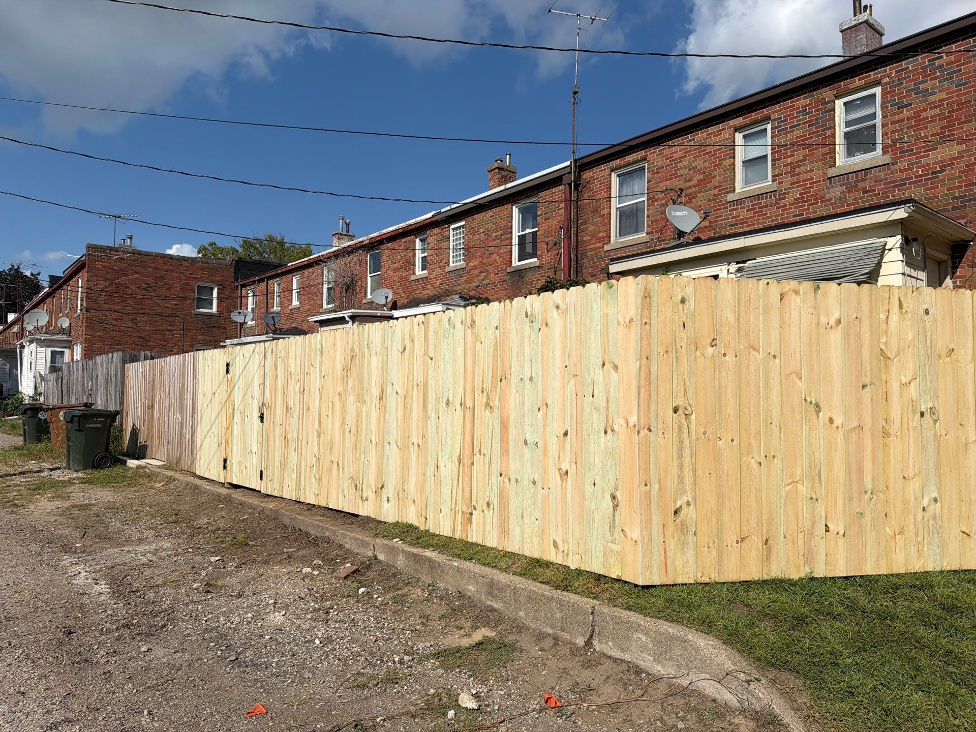 New Treated Wood Privacy Fence and Metal-Framed Gates by Perfect Picket Fence and Stain