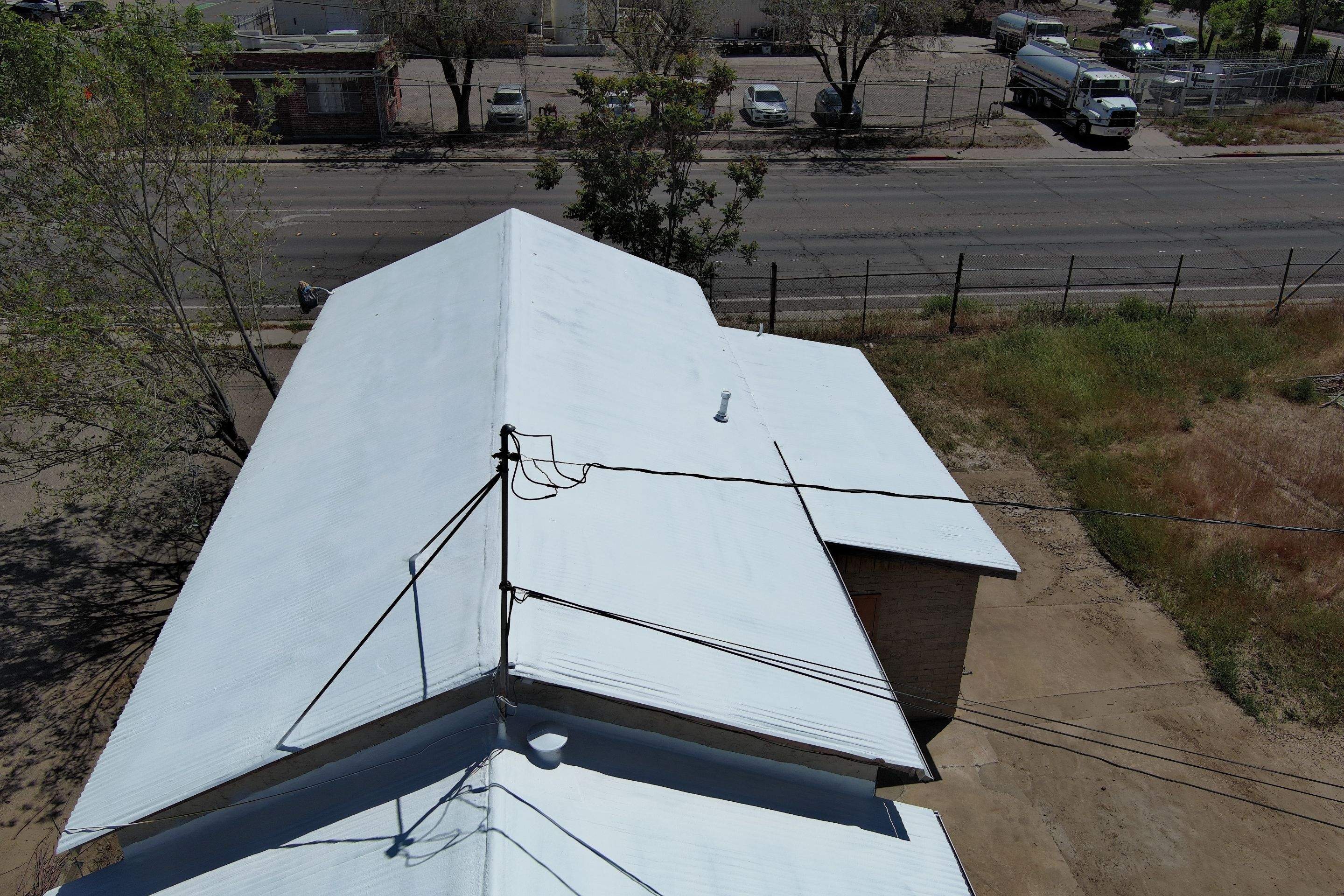Spray foam and coatings using Conklin Benchmark/PUMA XL by Straight Edge Roofing Inc