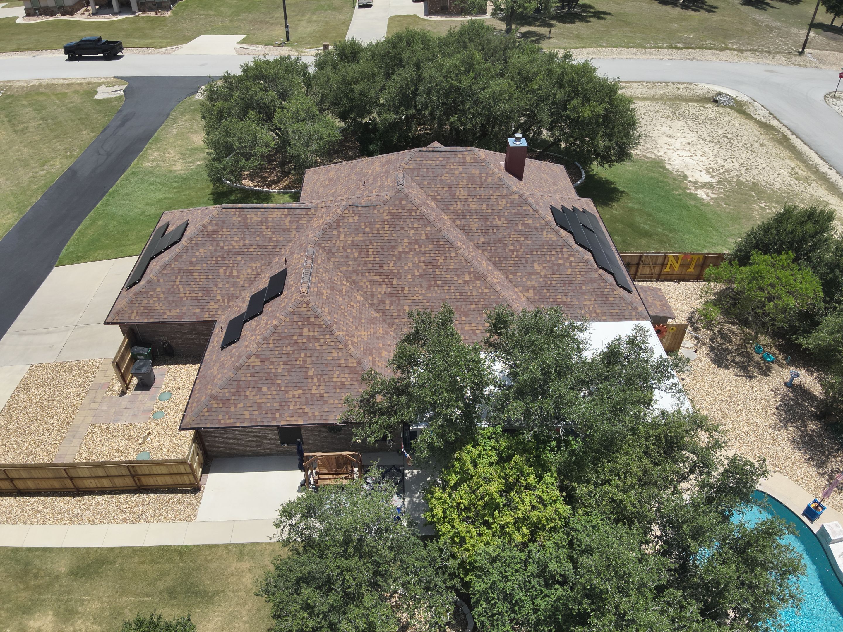 Residential Roof Replacement with Owens Corning - Duration - Sedona Canyon by Action Exteriors Austin